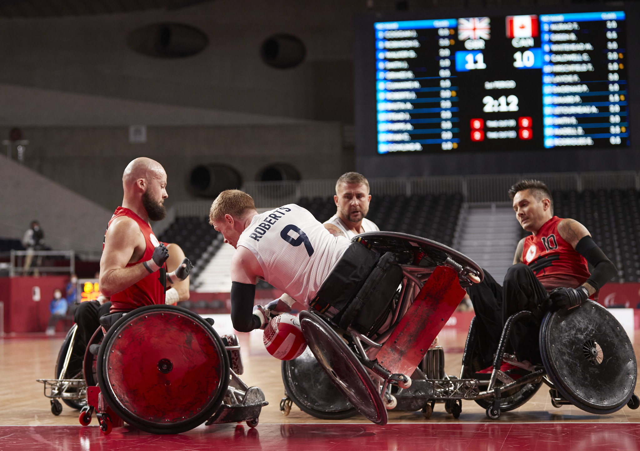 Stu and other players in wheelchair rugby.