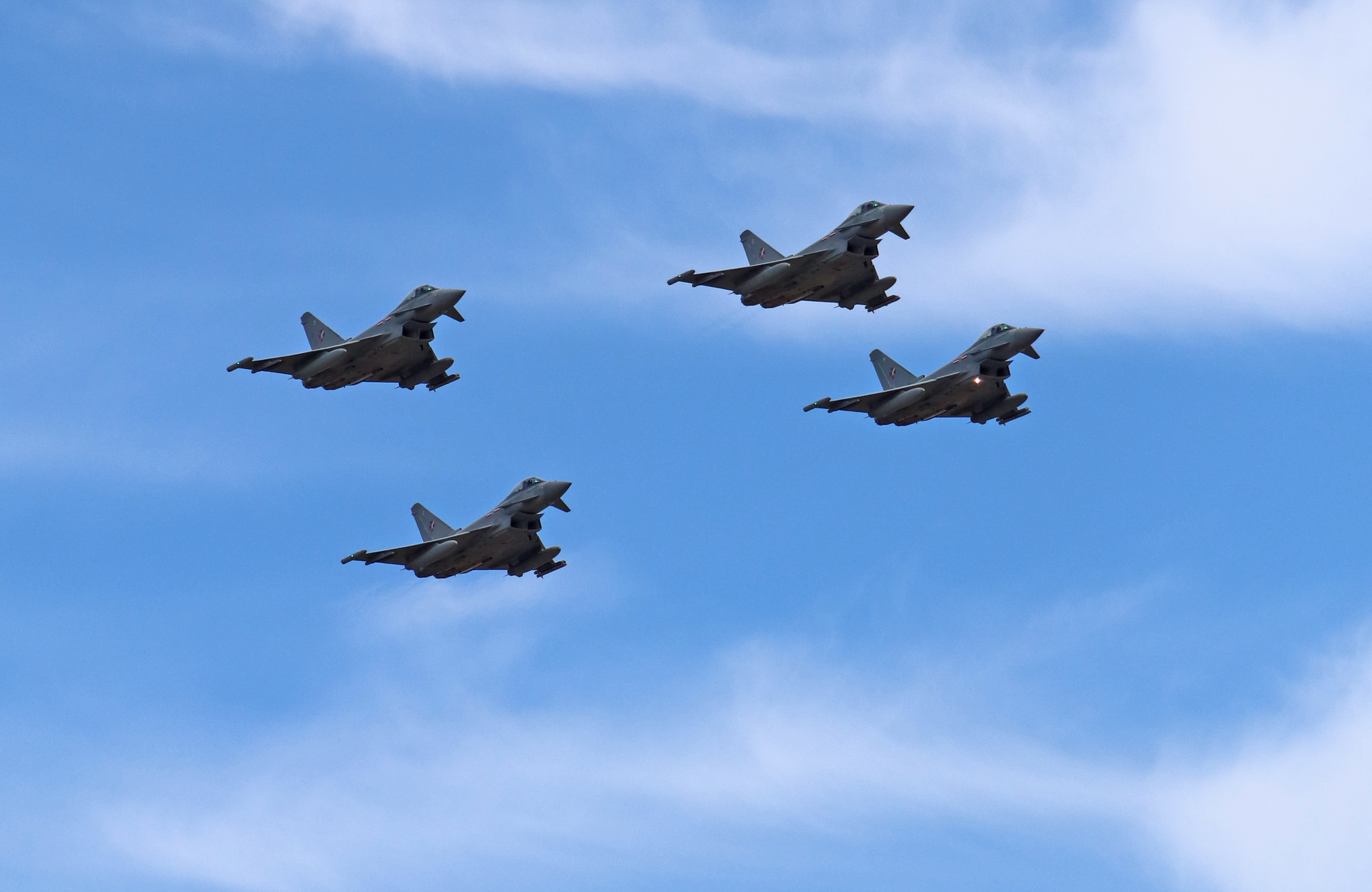 Image shows RAF Typhoons flying in formation.