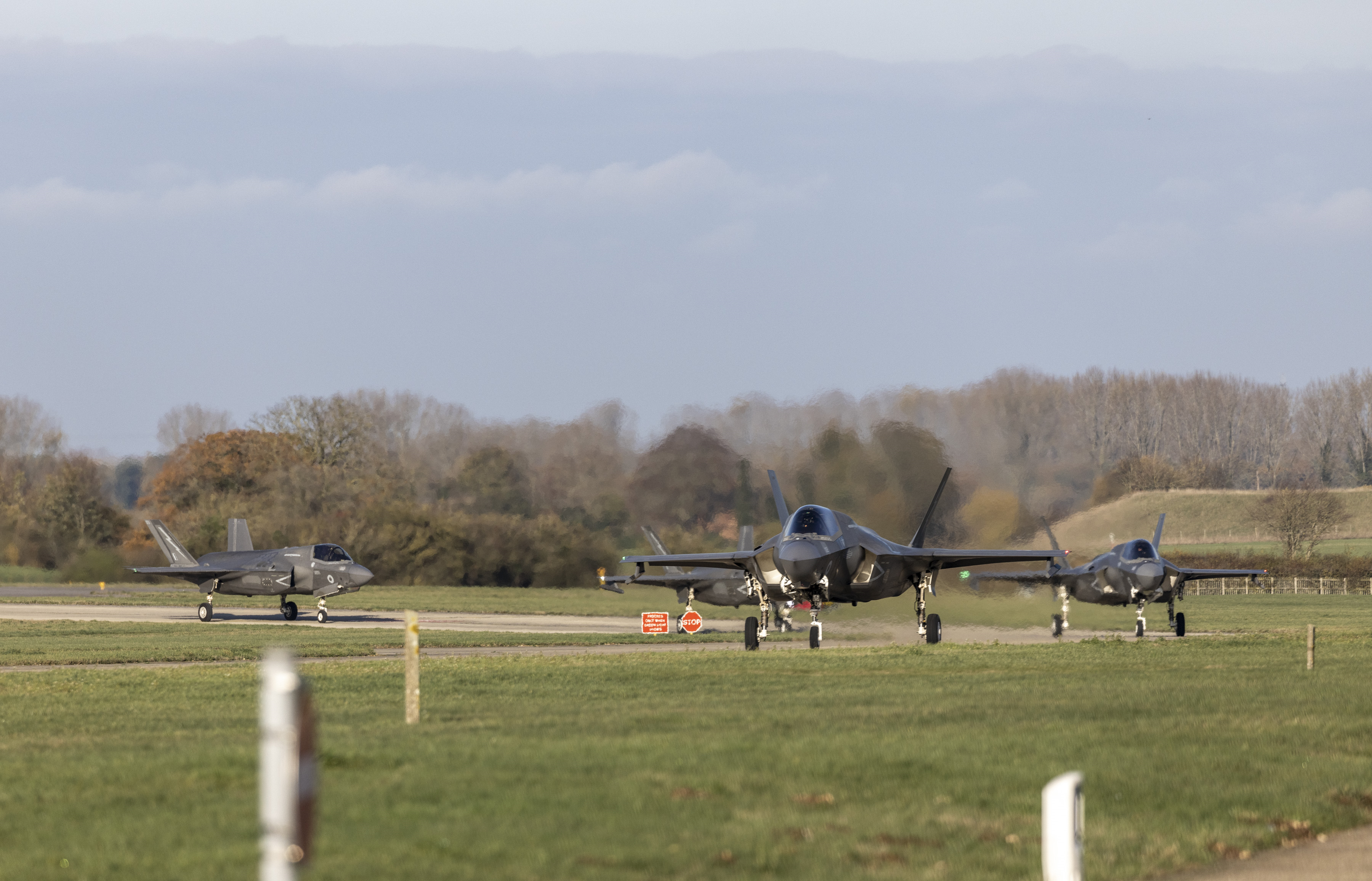 Image shows RAF Typhoons taxiing on the runway.