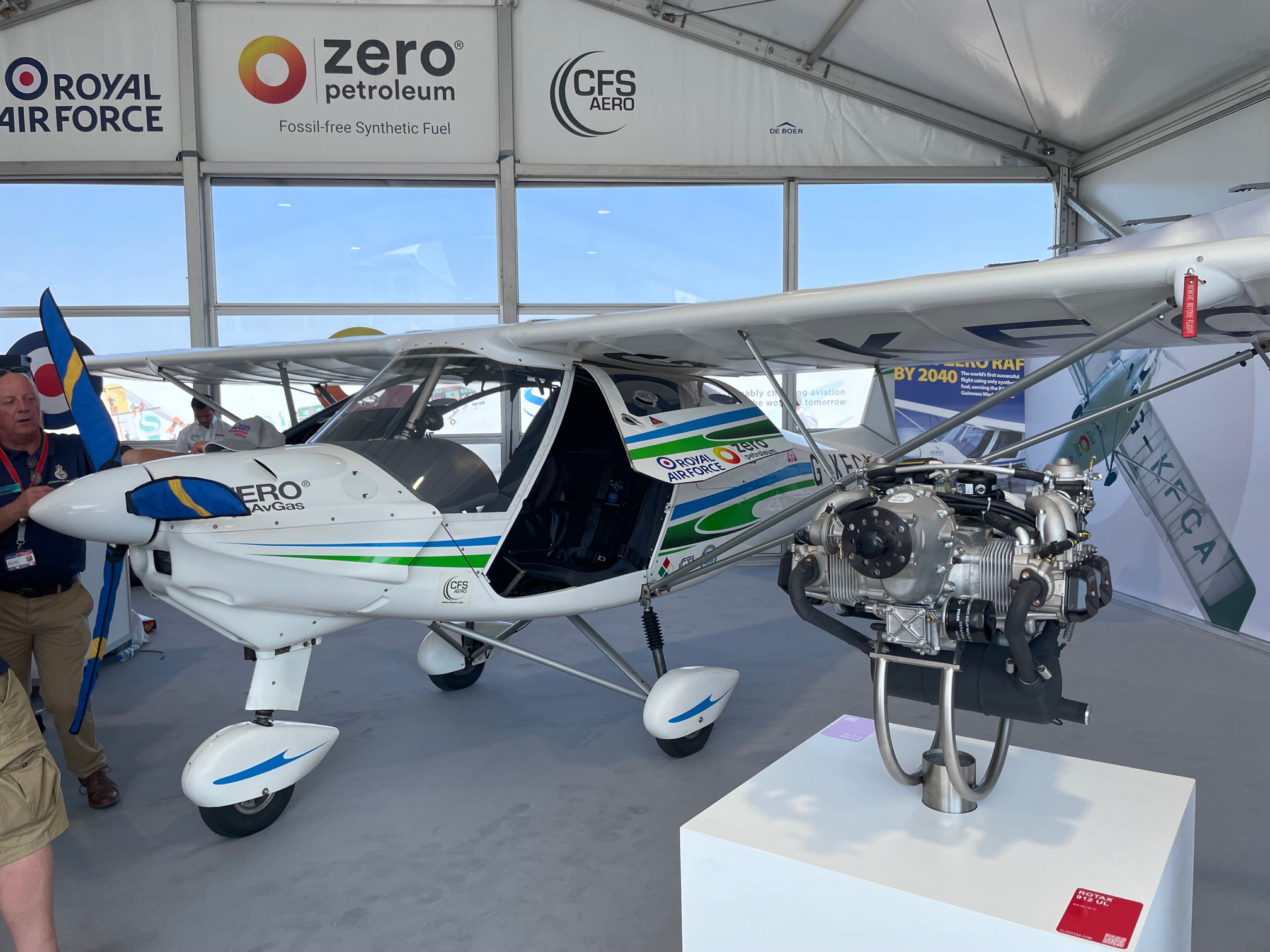 Image shows Ikarus microlight aircraft in showroom..
