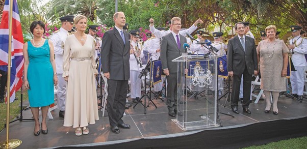 Image shows RAF Music Band performing on a stage with civilians.