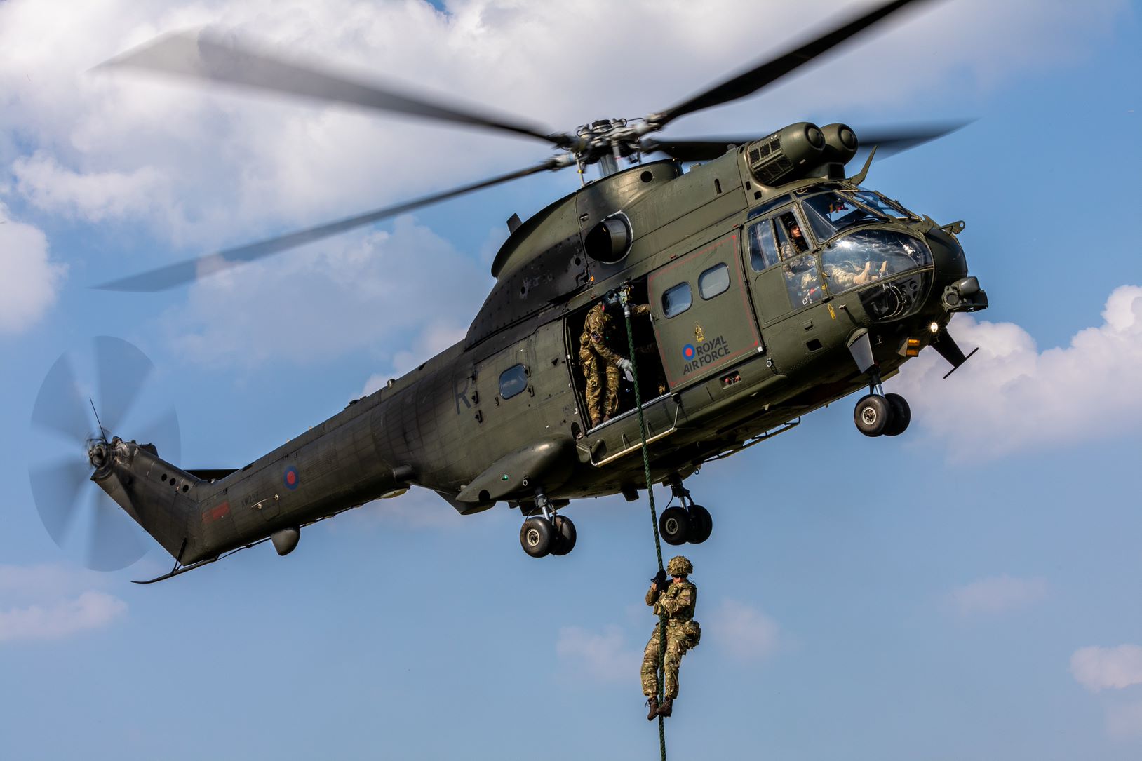 RAF FP Force Personnel Fast Roping from a Puma from 33 Sqn during a Joint Personnel Recovery Serial.