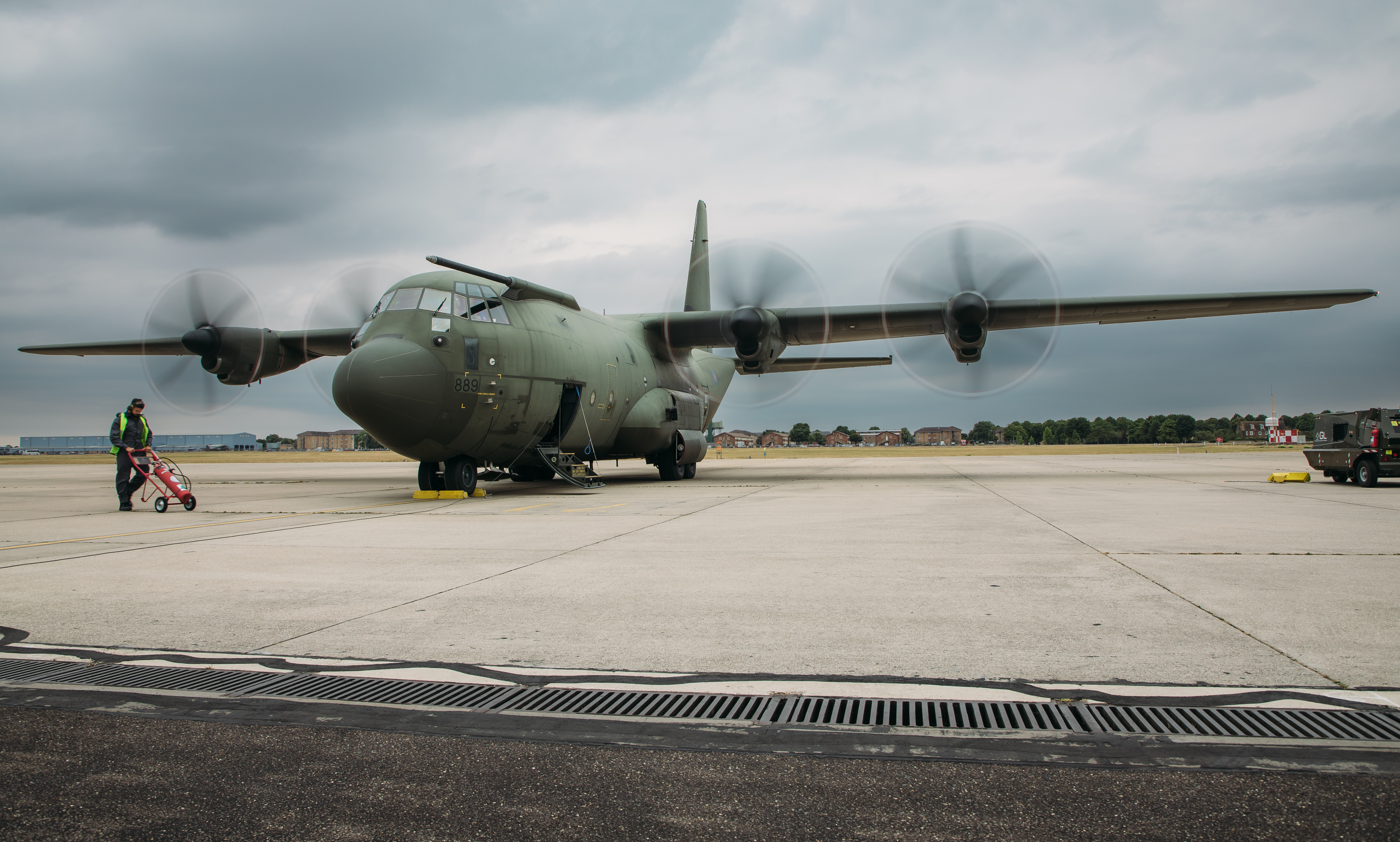Image shows Hercules aircraft on the airfield.