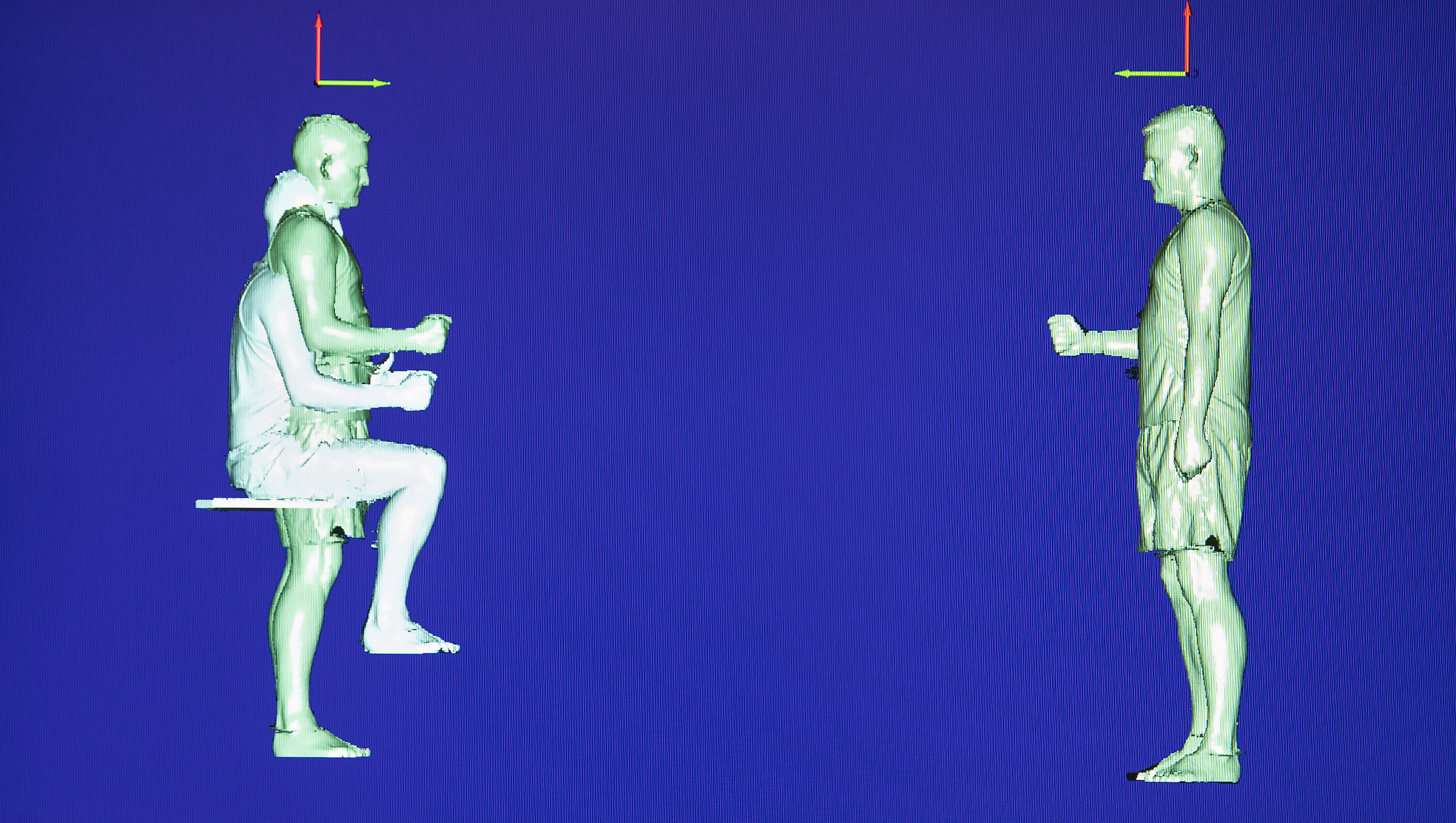 Image shows the human body on a digital screen, in seated and standing positions.