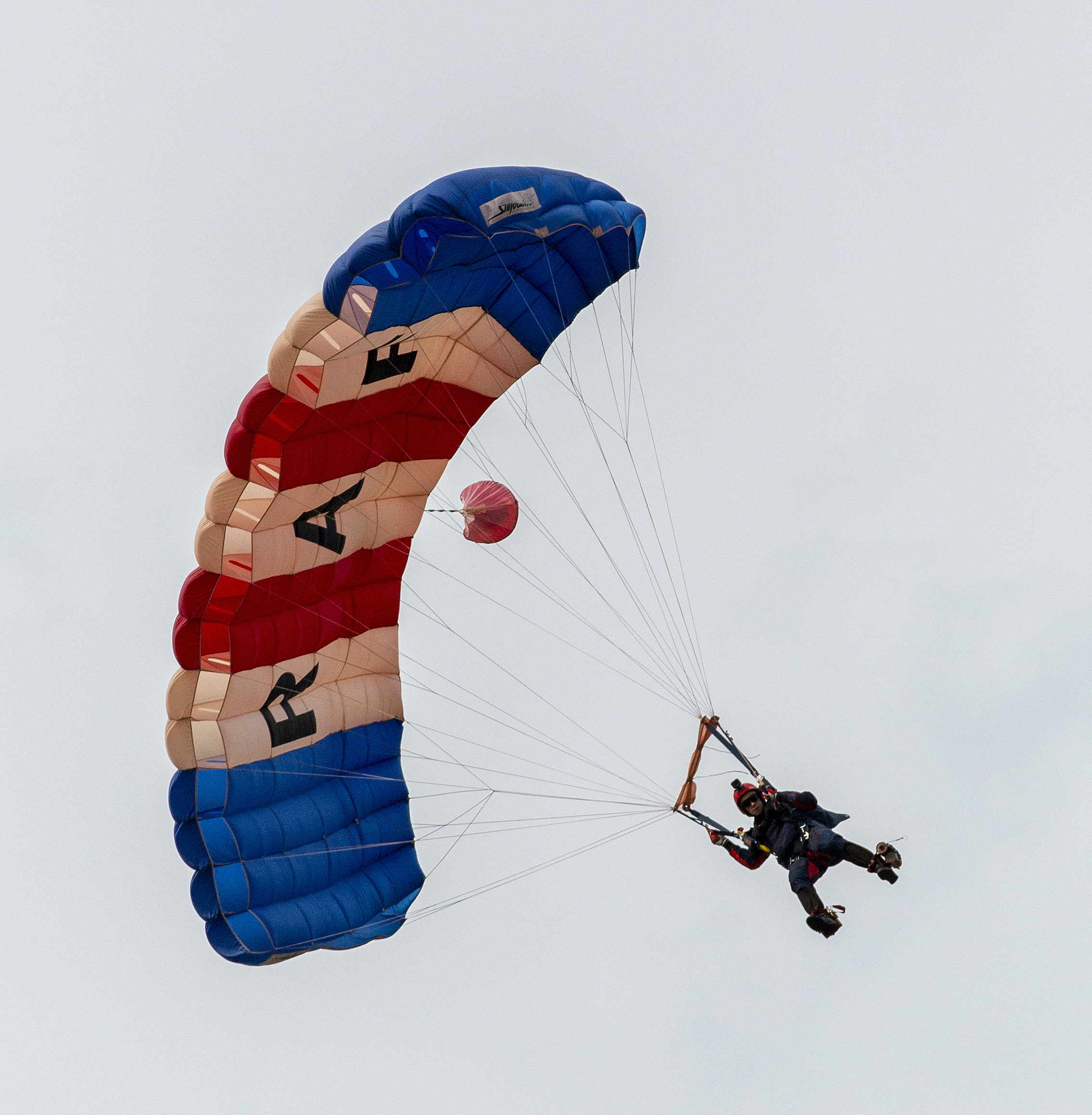 Image shows RAF Falcon performing with deployed parachute.