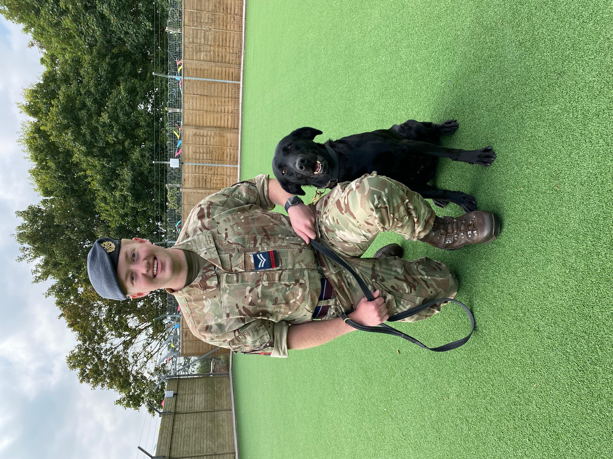 Personnel with dog.