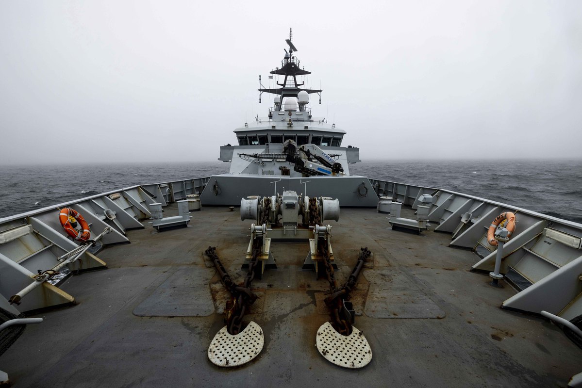 Image shows the deck of a HMS Royal Navy ship. 