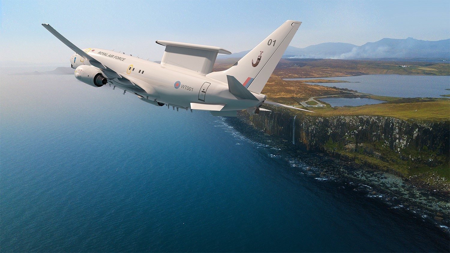 Image of Wedgetail aircraft in flight over cliffs.