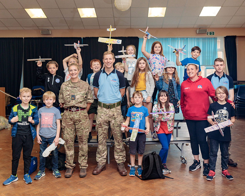 RAF Brize Norton Station Commander Claire O'Grady, STEM Ambassador and Children - Children and young people of personnel at RAF Brize Norton benefitted from a huge range of events organised by Community Support, Airplay and RAFA Kidz this summer.