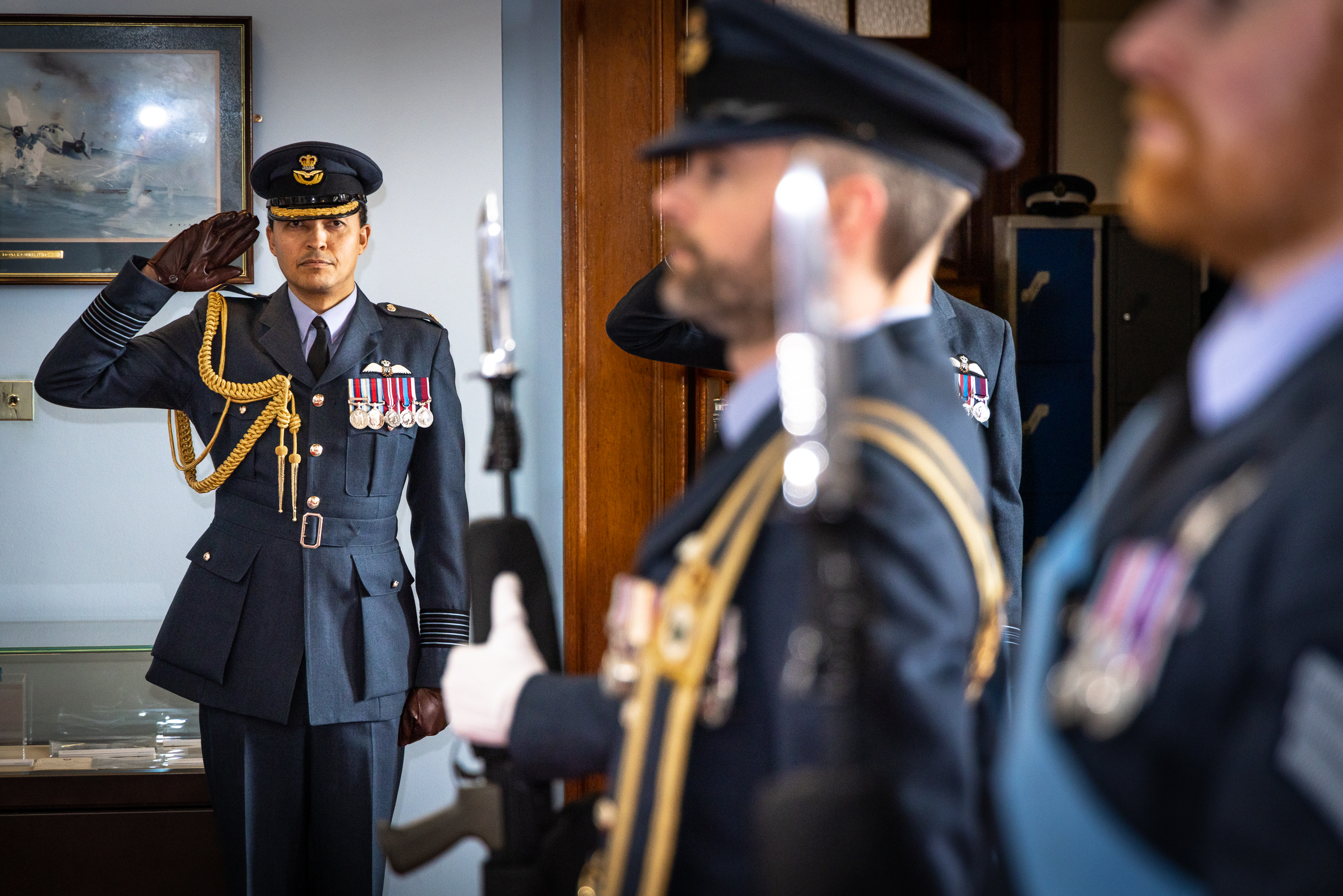 Image shows RAF aviators inside Officers' Mess during ceremony.