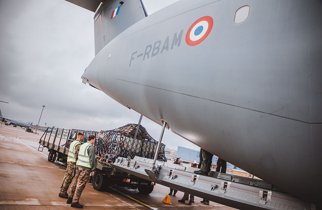 Flight Sergeant Jamie Edwards, A Royal Air Force Air Loadmaster on exchange to the French Air Force has returned to RAF Brize Norton for the day to conduct trials with Number 206 Heavy Aircraft Test & Evaluation Squadron and the Joint Air Delivery Test and Evaluation Unit (JADTEU).