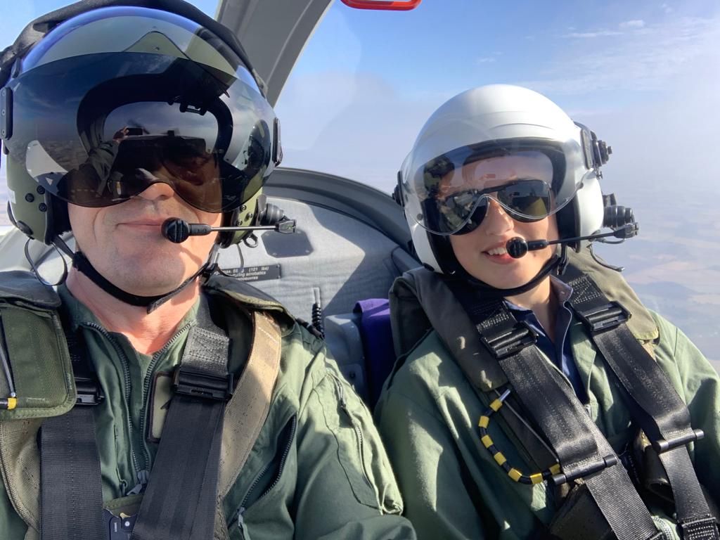 Pilot and Air Cadet in a glider mid-air