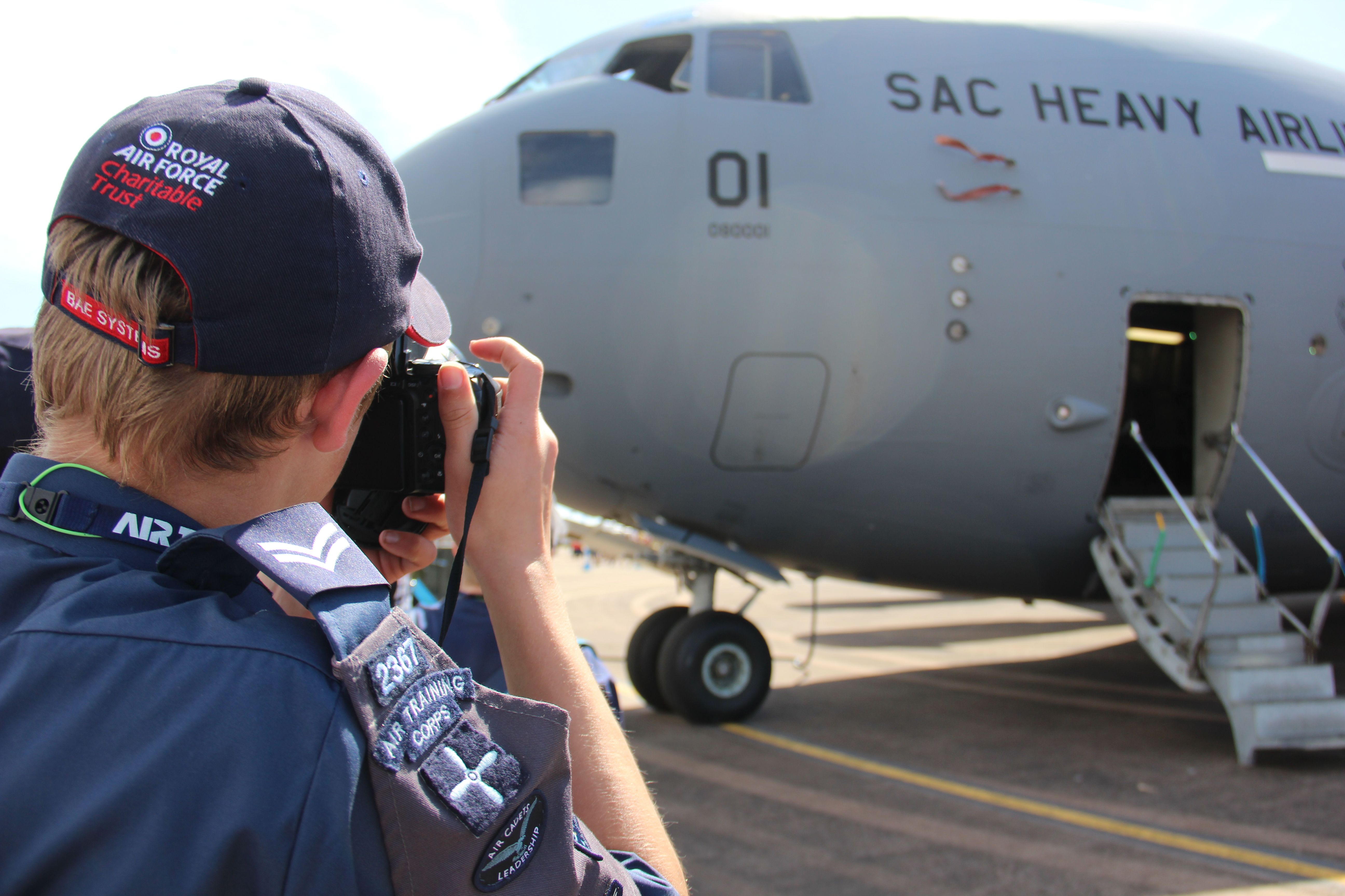 Cadet taking a photo of an RAF aircraft