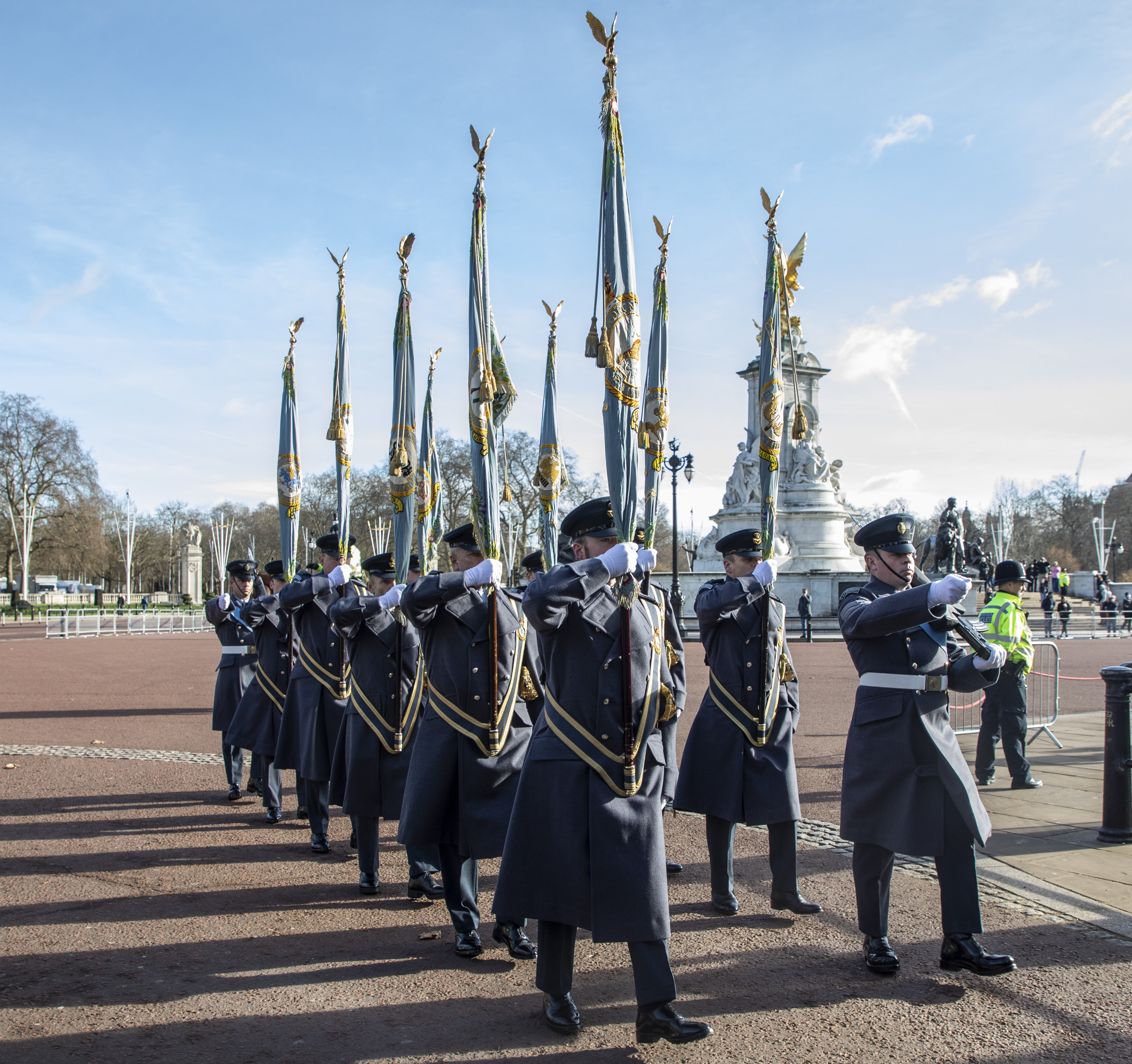 Queen's Colour Squadron with flag colours on parade outside Buckingham Palace.