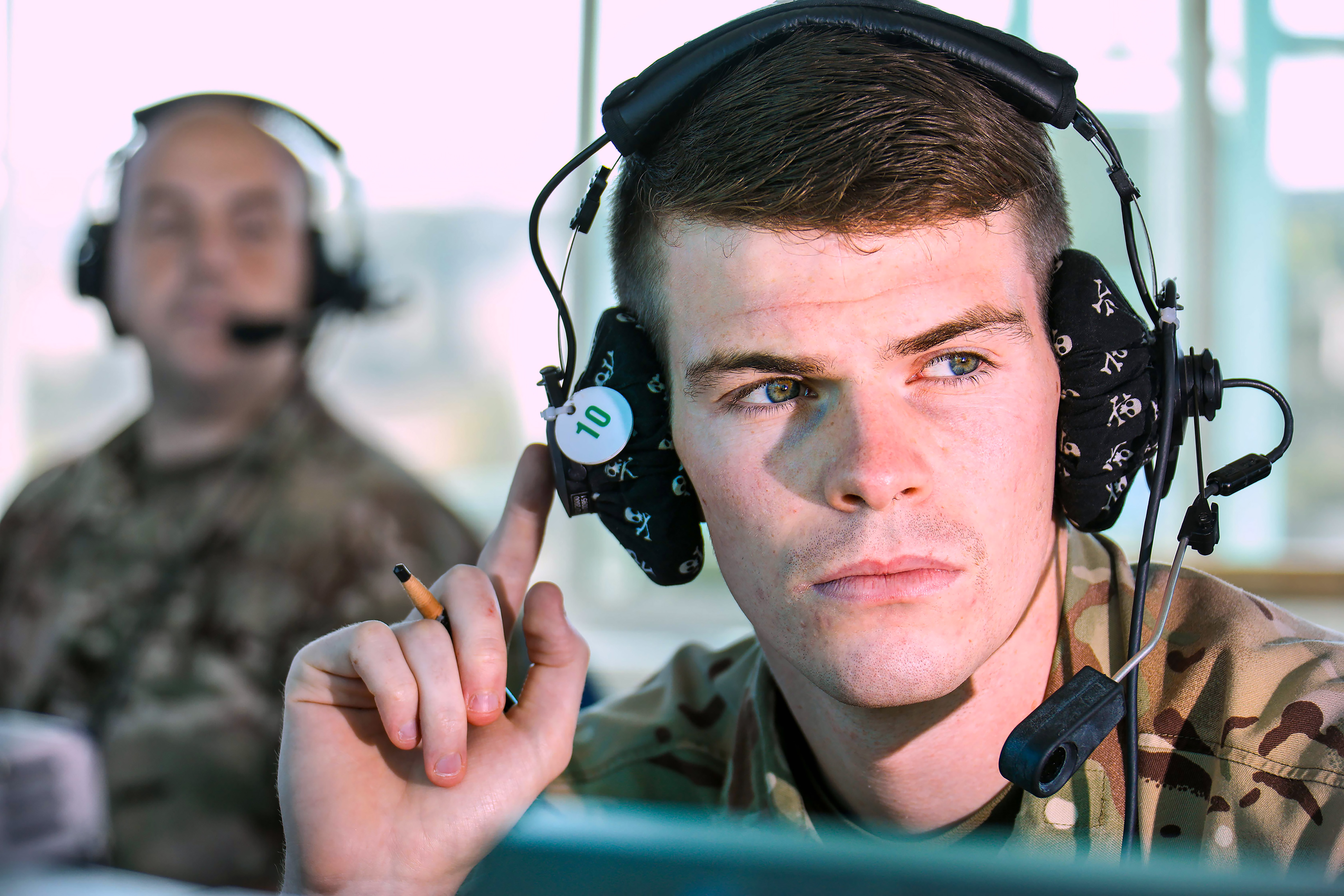 Image shows RAF aviator wearing headset.