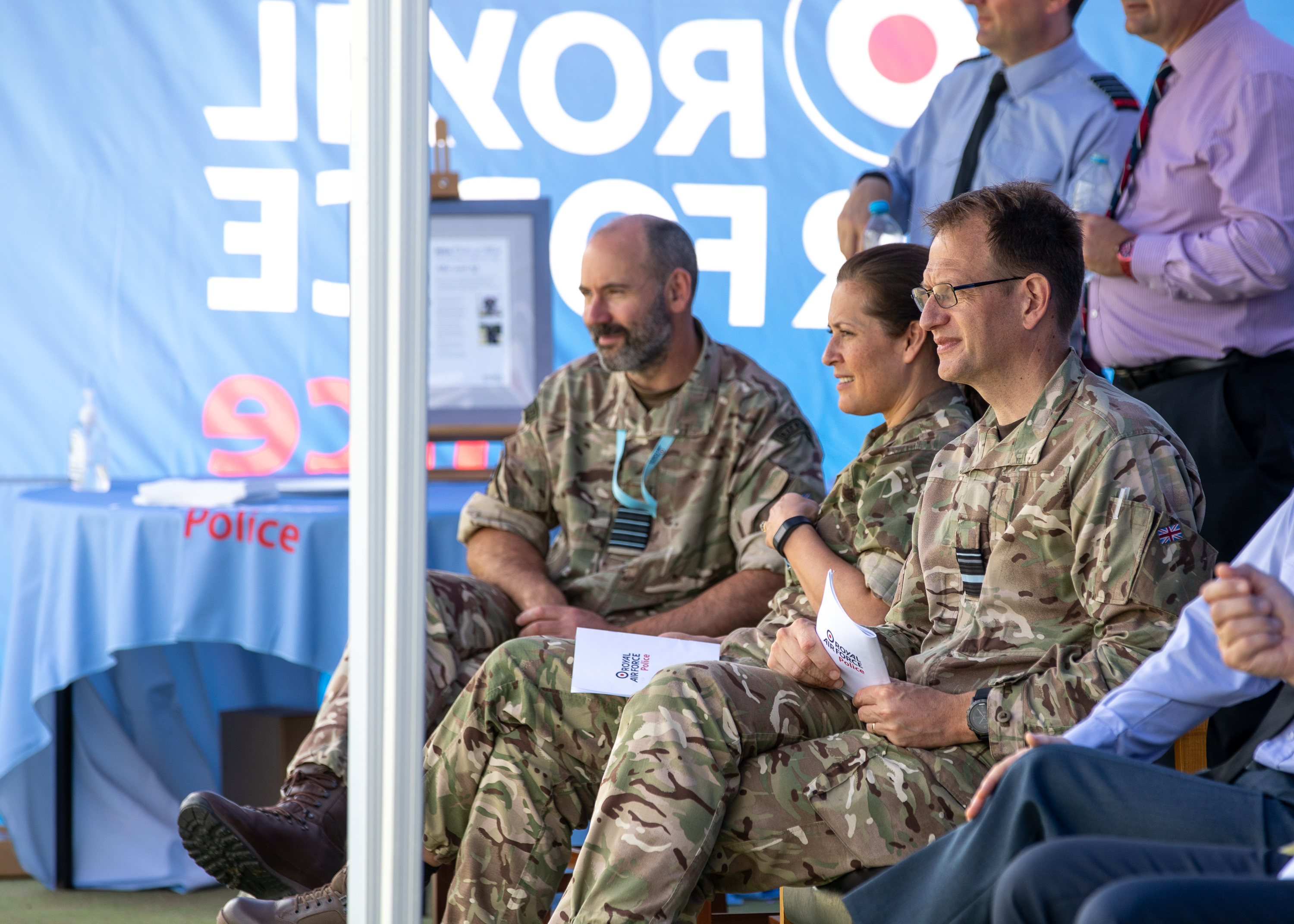 Station Commander, AOC 2 Gp (Des) and AOC 2 Gp watch the final of the Military Working Dog Trials 