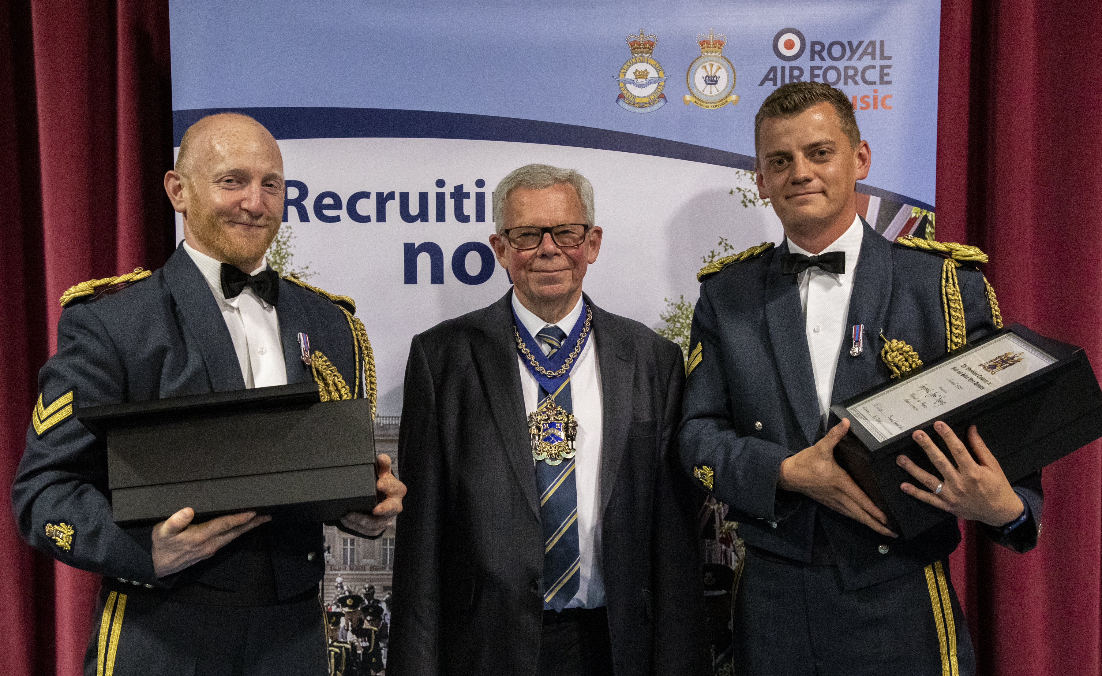RAF Musicians hold certificate awards with Adjudicators.