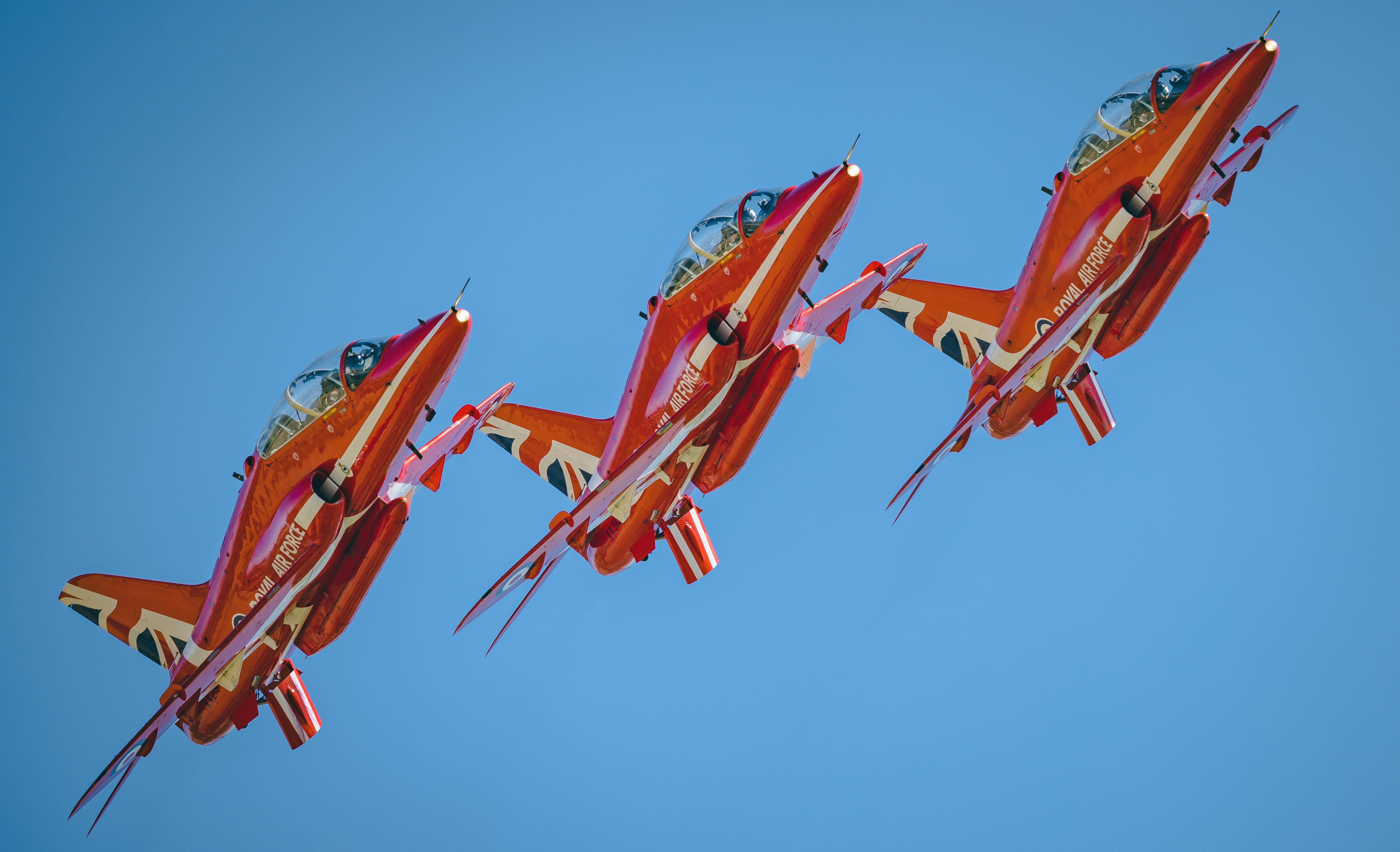 Image of the three RAF Red arrows flying in formation.