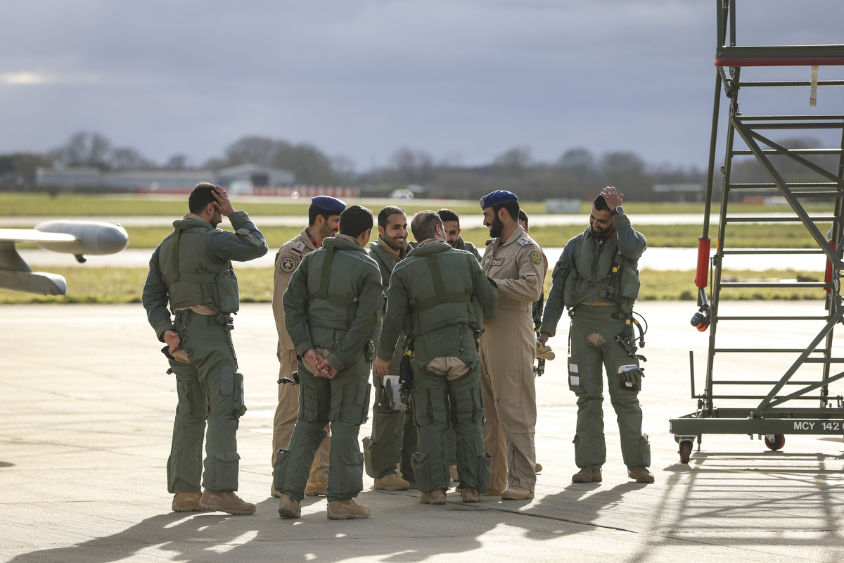 Image shows Joint RAF Qatari Squadron together on the airfield.