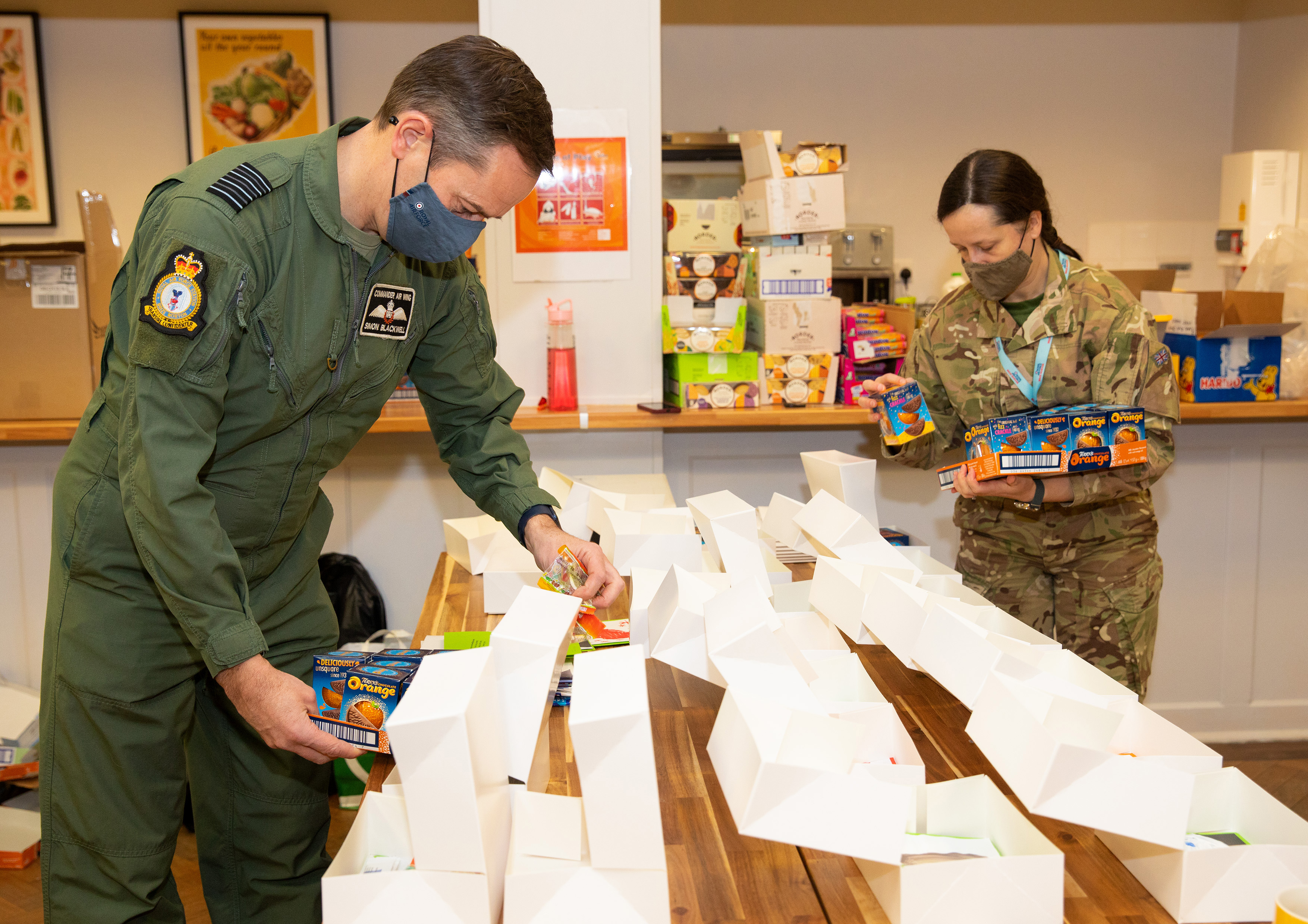 It was all hands-on deck to make up Christmas boxes for those who are deployed during the holiday season.