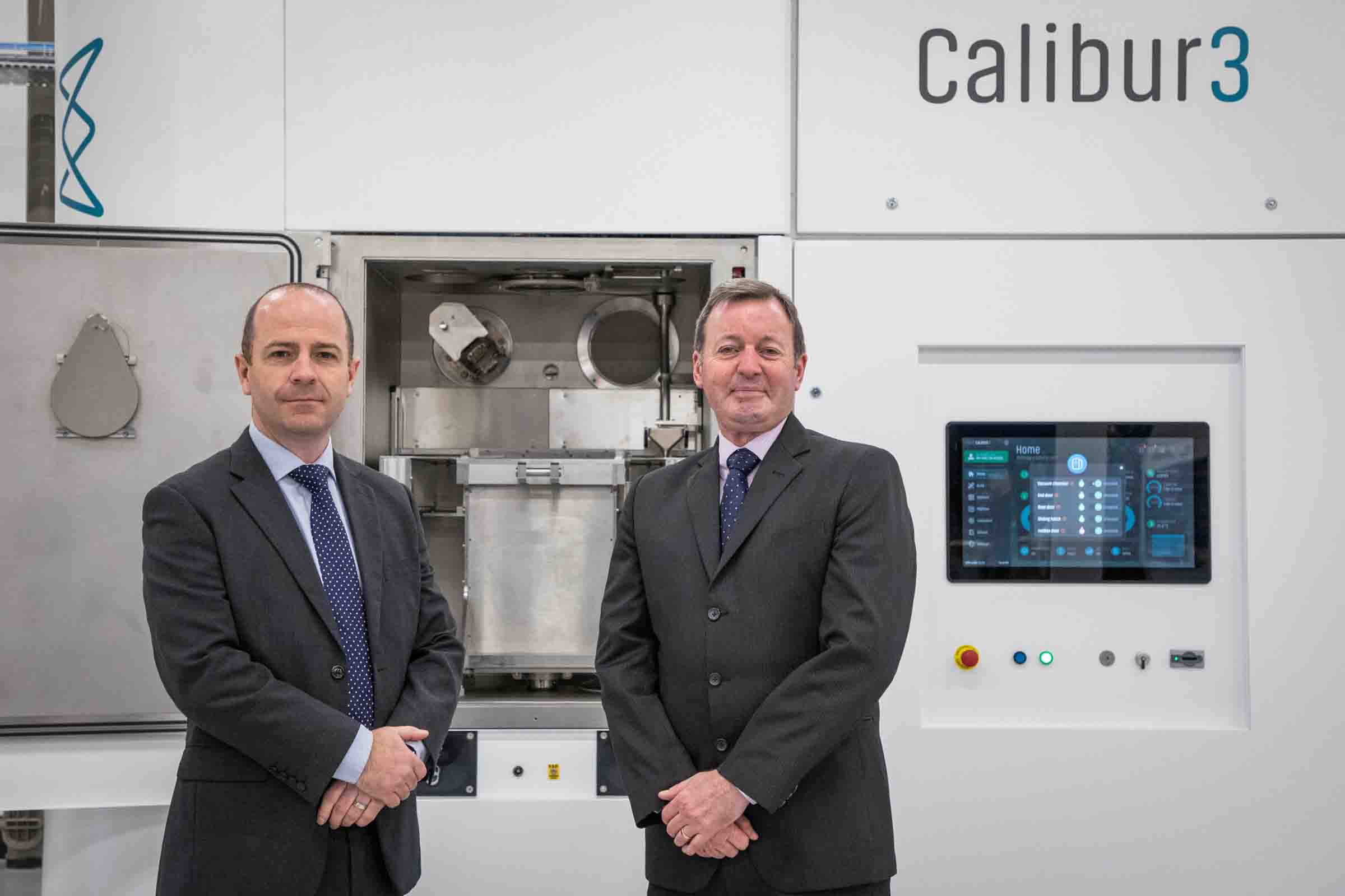 From left to right: Group Captain Craig Watson and Squadron Leader Allen Auchterlonie on front of the Wayland Additive Calibur3 3D printer