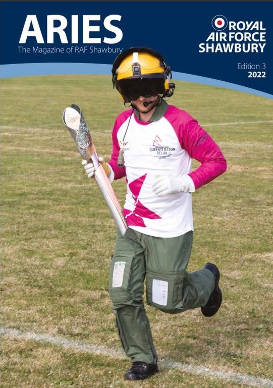 Front cover of Aries magazine shows front cover of Aries Magazine which features a RAF aviator running with the Commonwealth games torch.