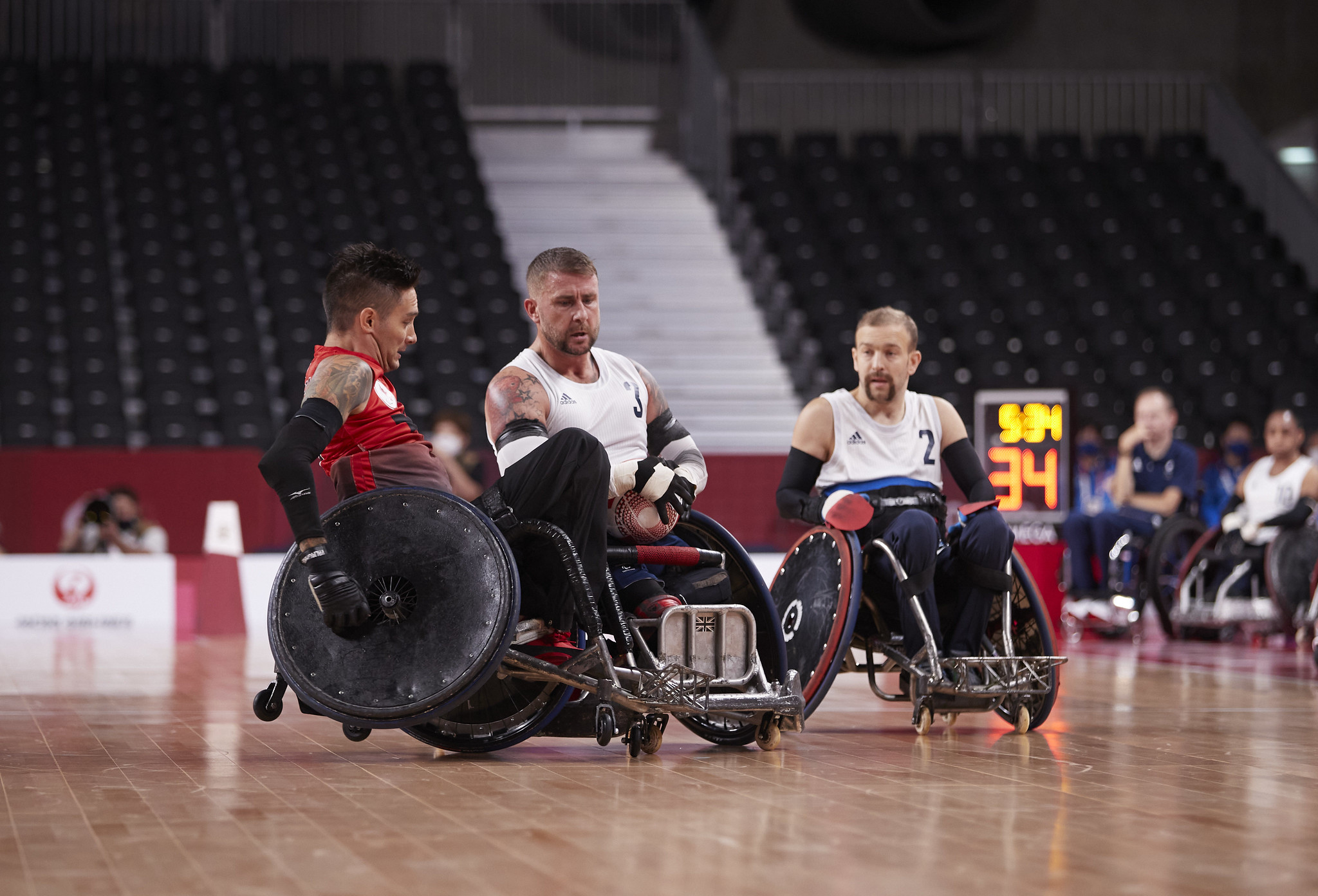 Stu and other players in wheelchair rugby.