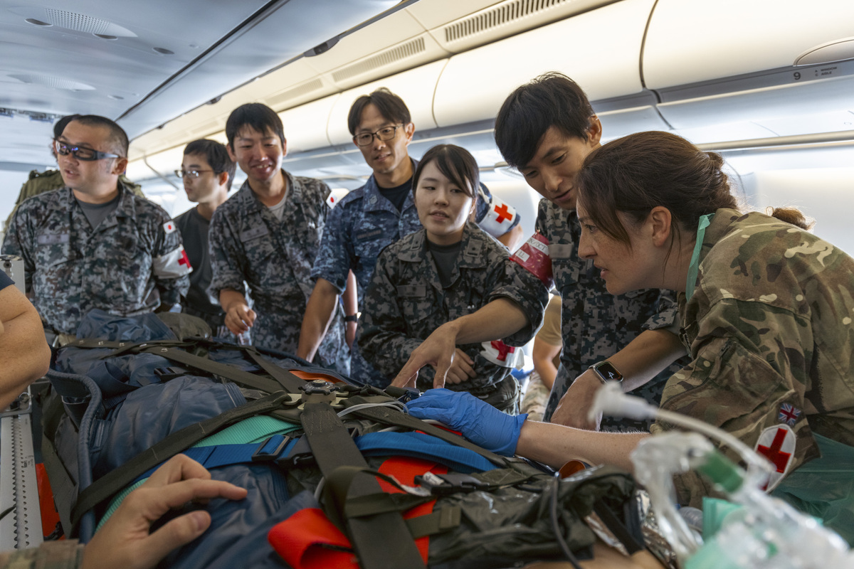 Japanese medics working with RAF medics onboard RAF Voyager