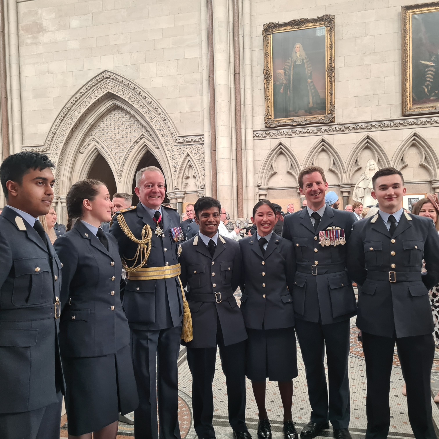 Image shows RAF personnel and cadets standing in St Clements Danes Church.