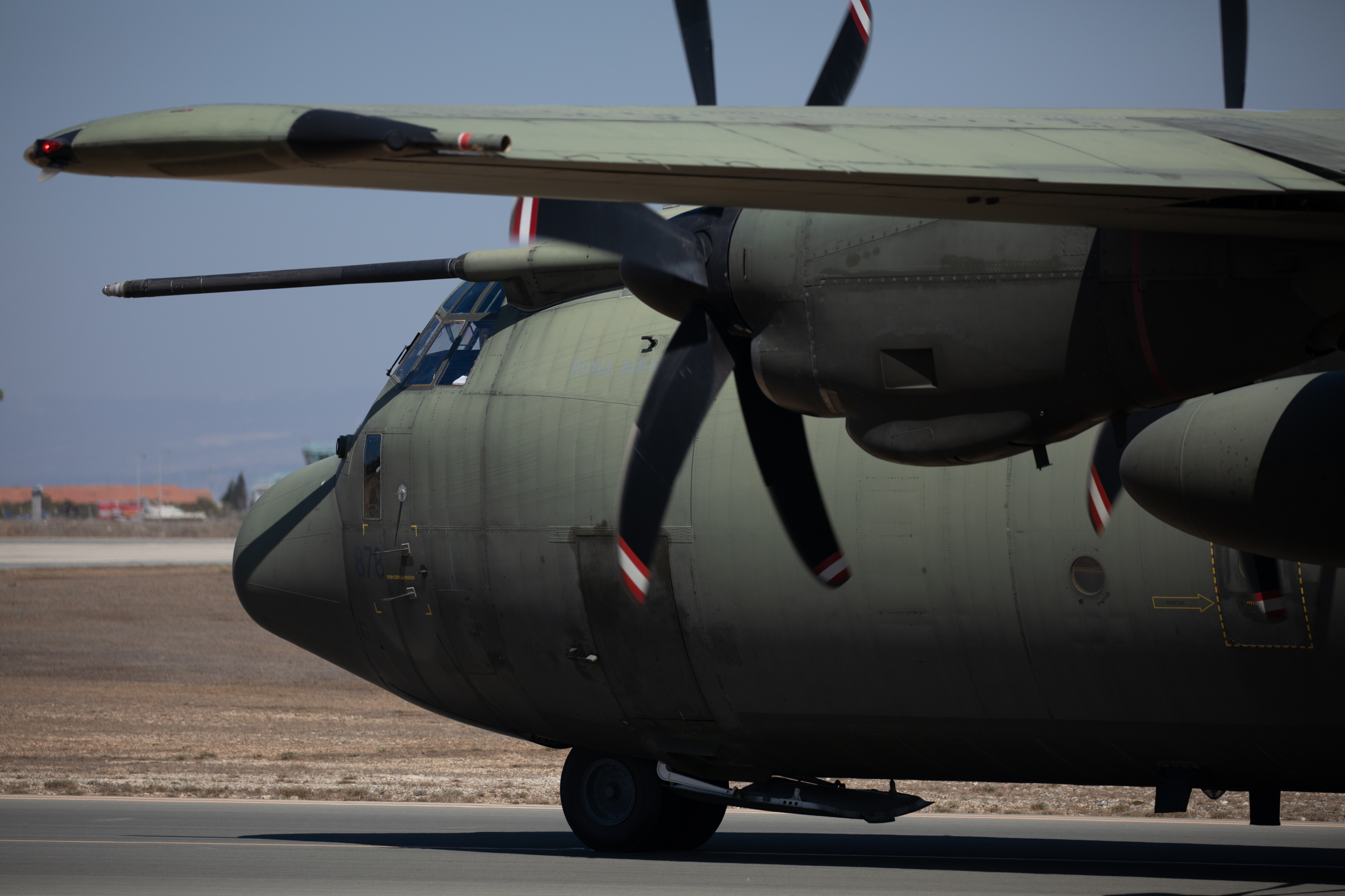 Image shows RAF Hercules on the airfield.