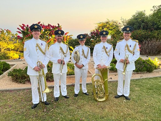 Image shows RAF Brass Quintet standing outside.