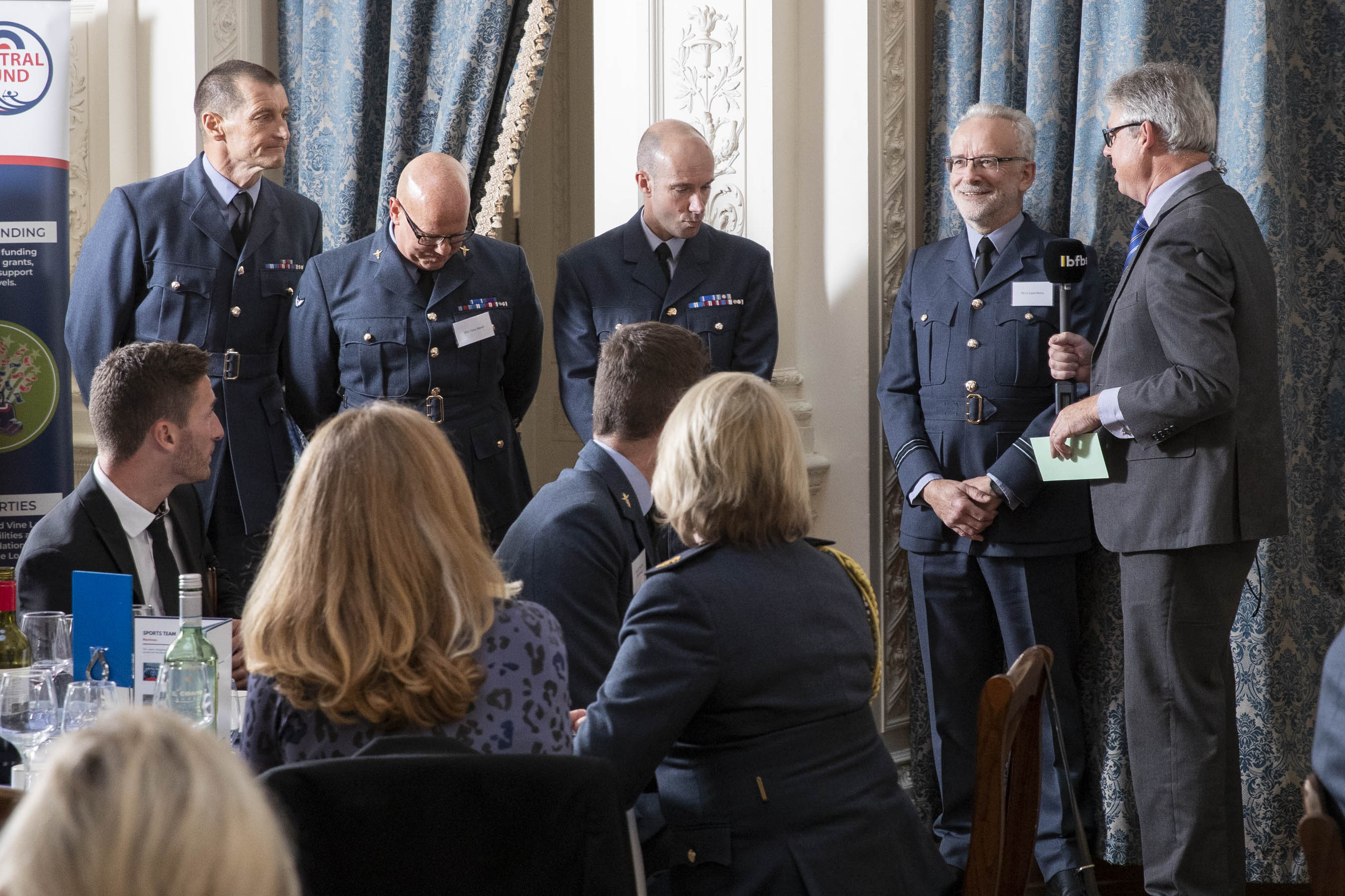 Image shows RAF personnel receiving award.