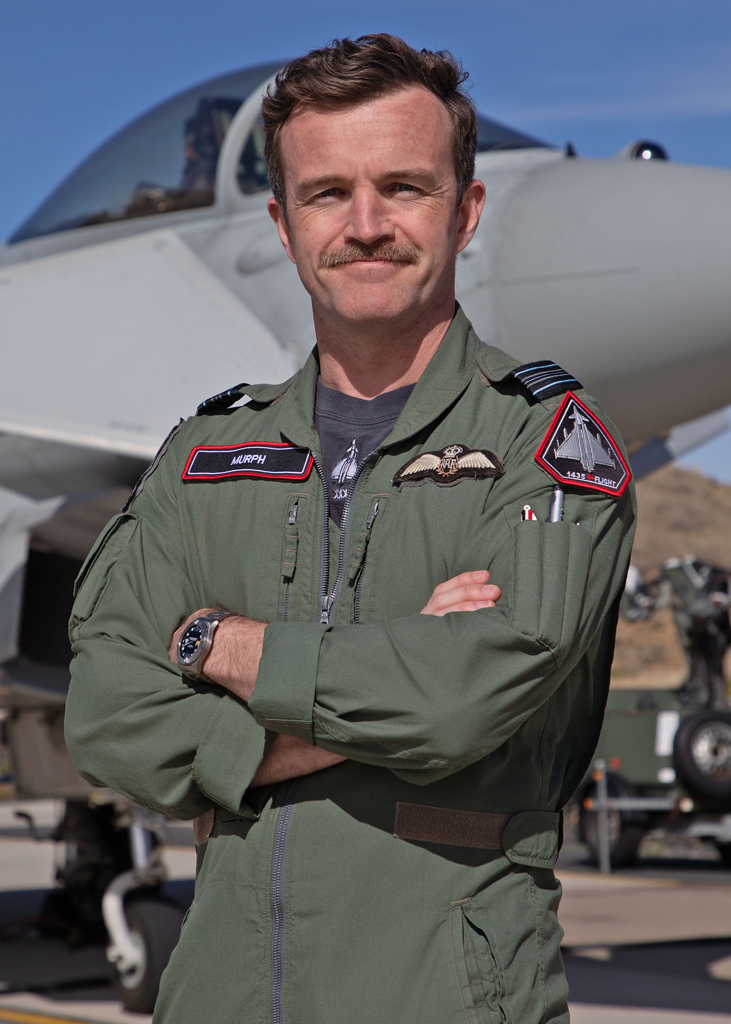 Image shows RAF aviator standing by a RAF Typhoon on the airfield.