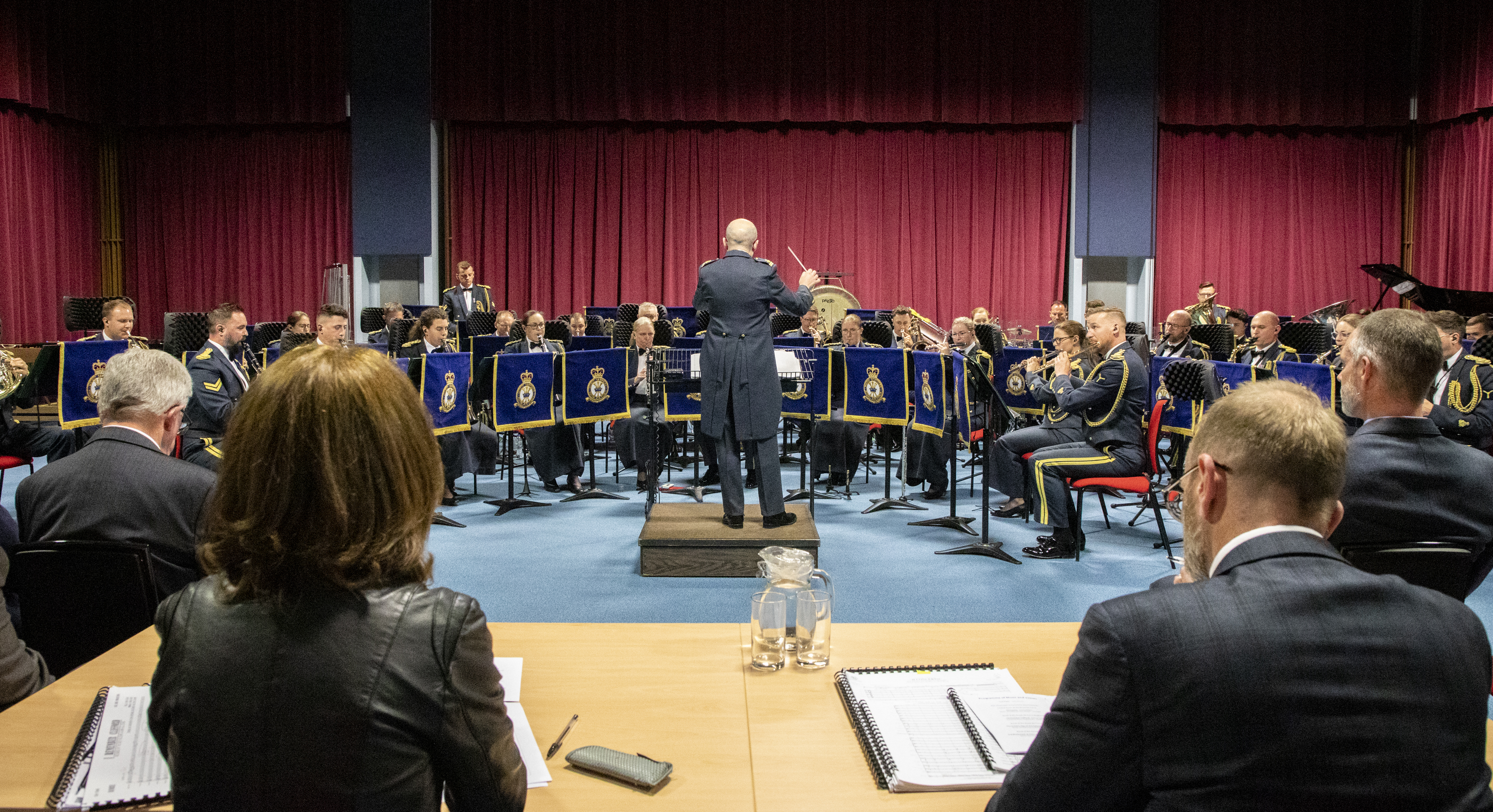 Conductor and Band are watched by Adjudicators.