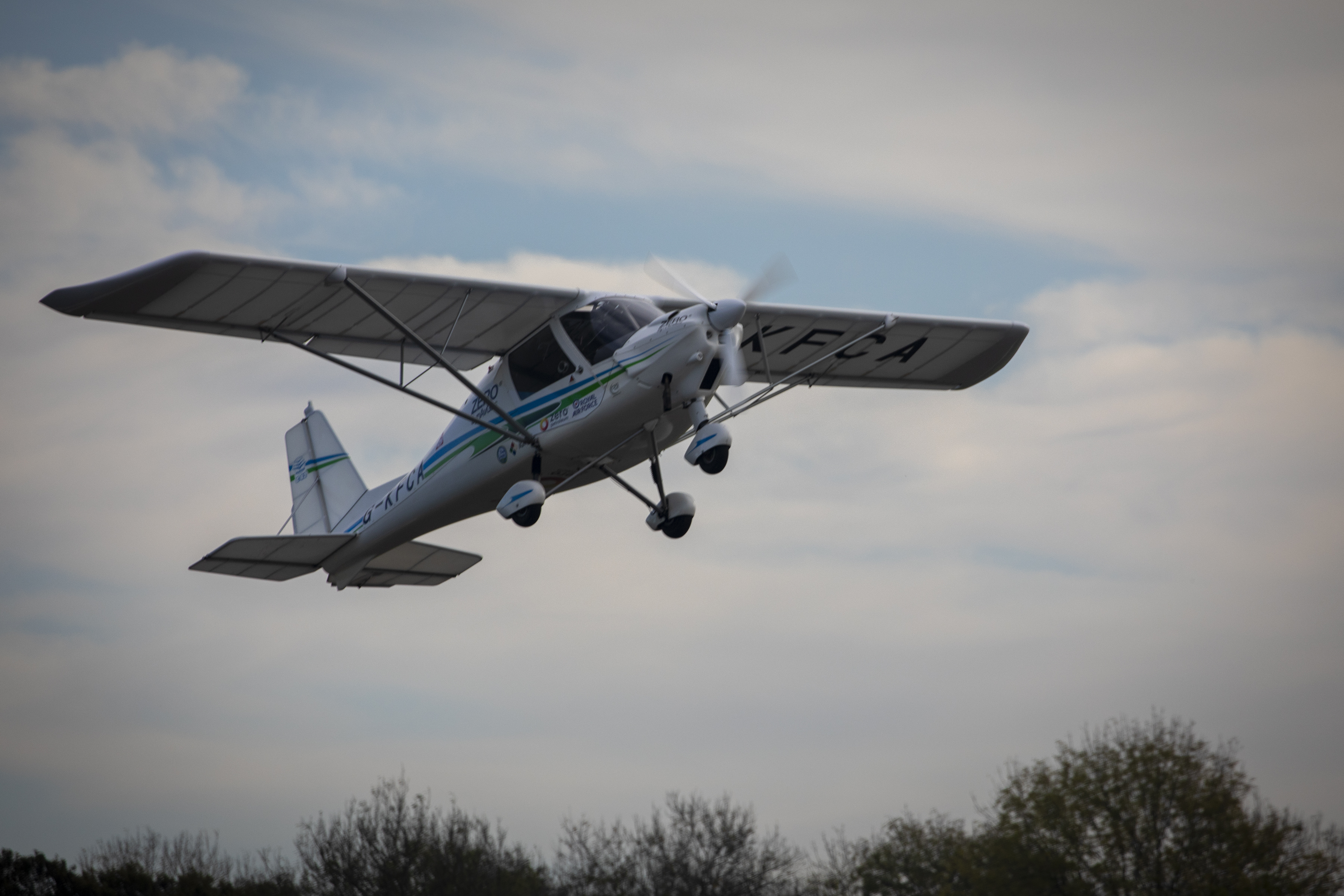 Image shows Ikarus microlight aircraft taking off.