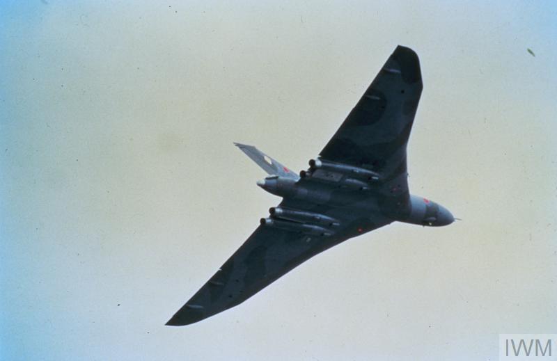 Aged image of Vulcan Bomber in flight.