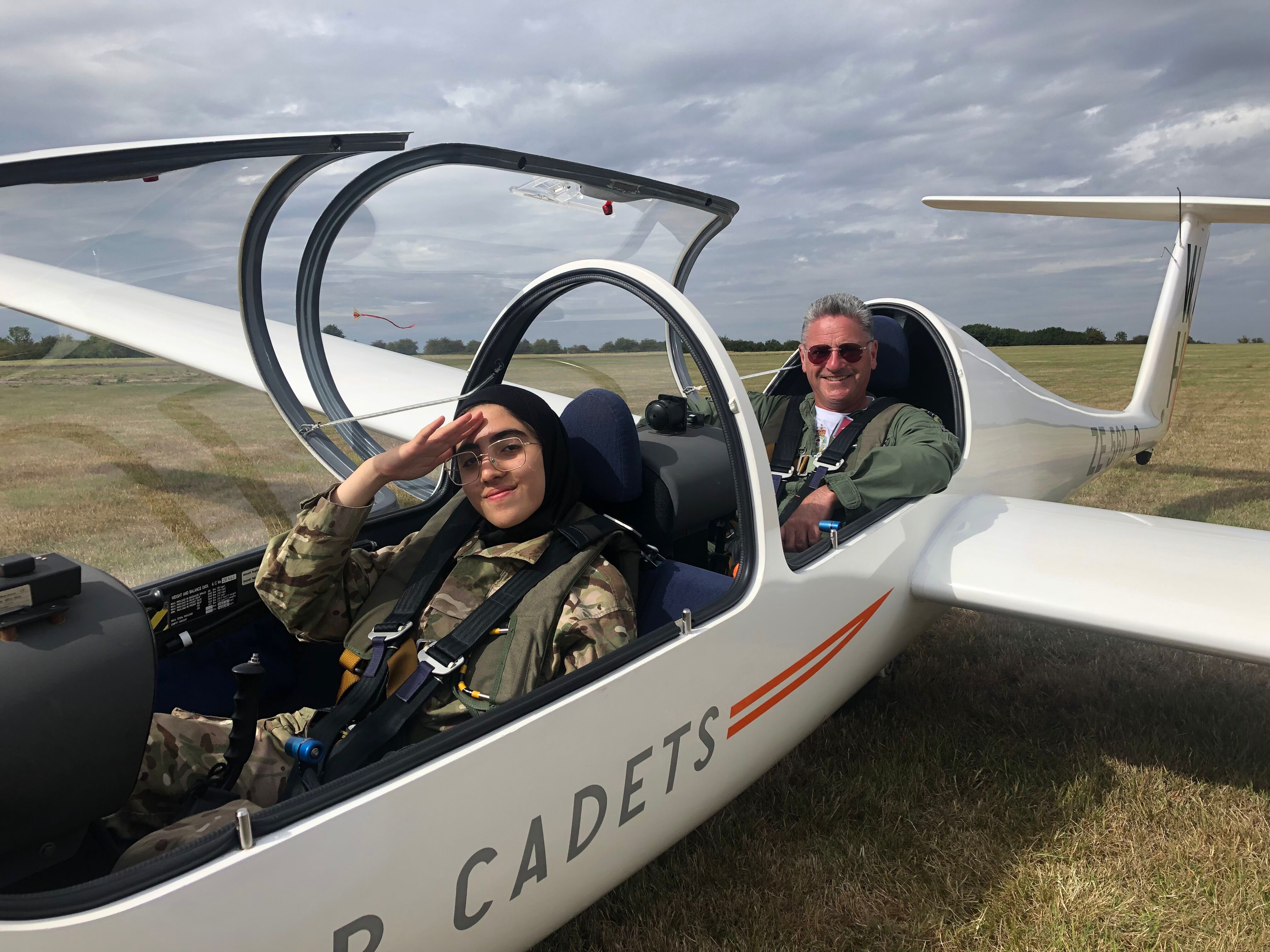 Volunteer and cadet in a glider before take-off