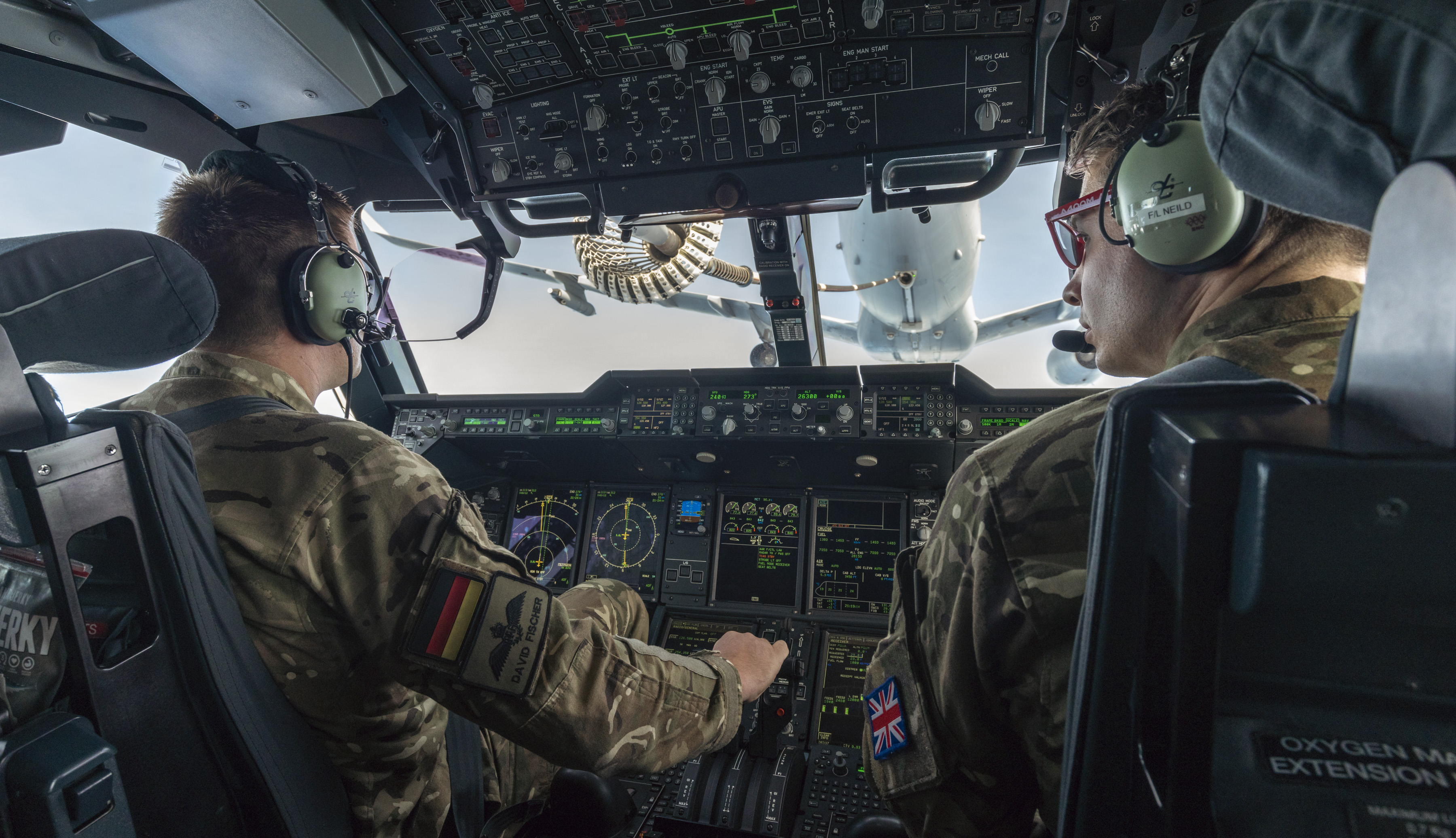 German Air Force pilot and RAF pilot flying together in Atlas during air-to-air refuelling