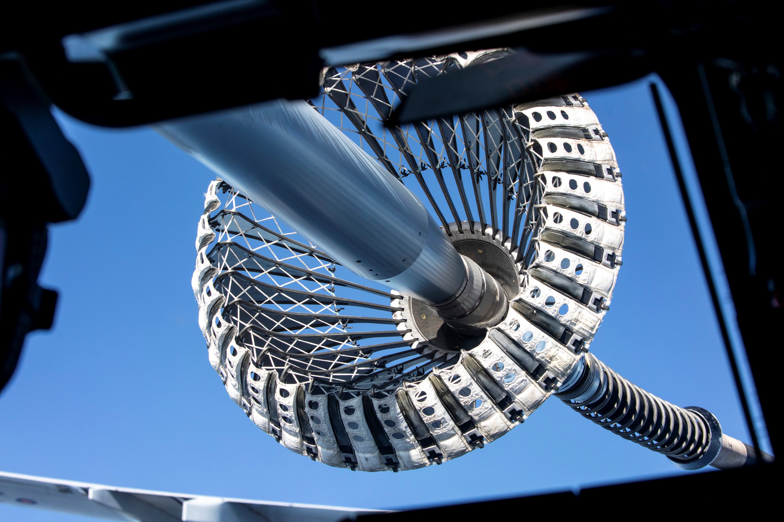 Image shows close up of air-to-air refuelling pipe equipment.