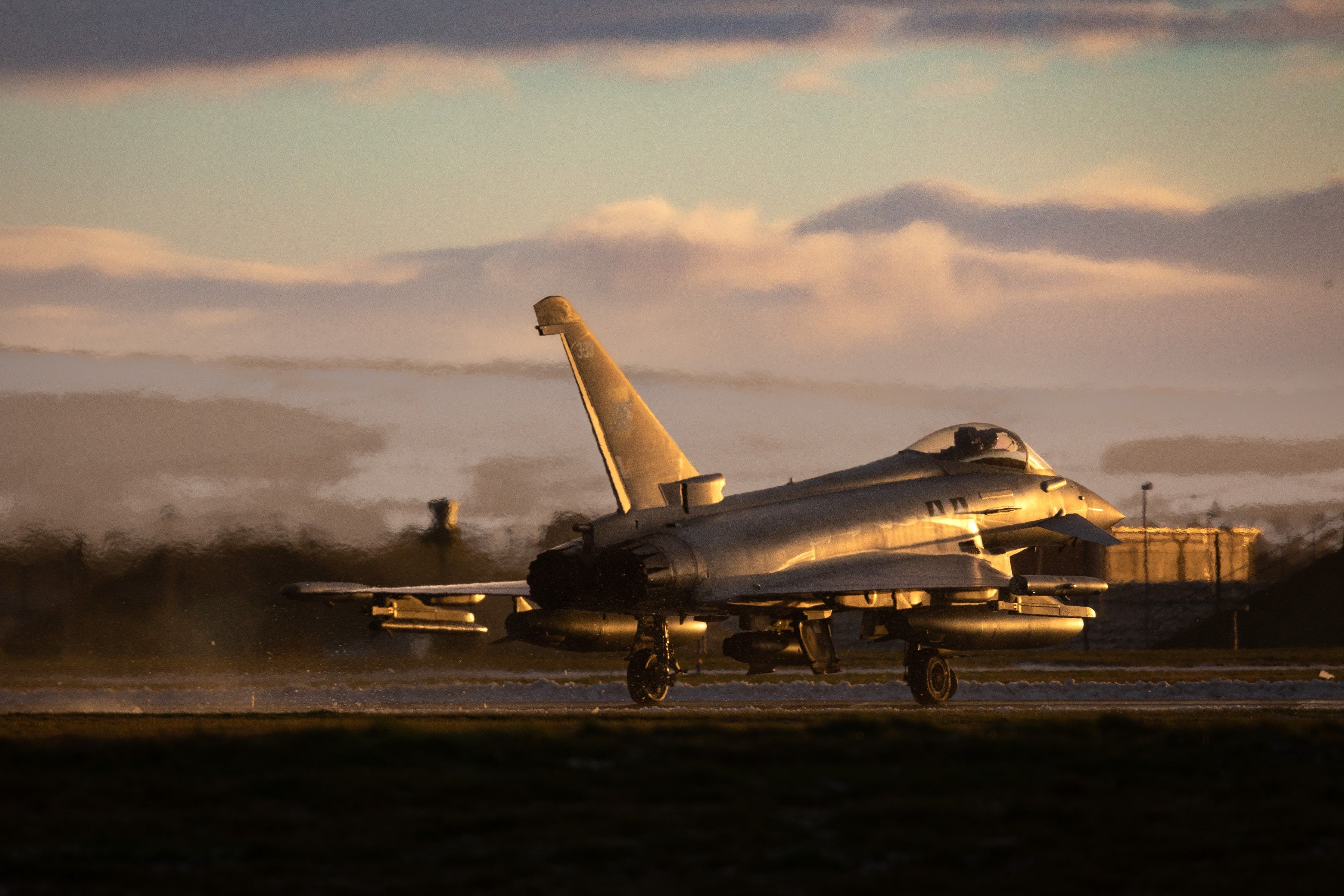 Typhoon on runway with the heat trail distorting the background