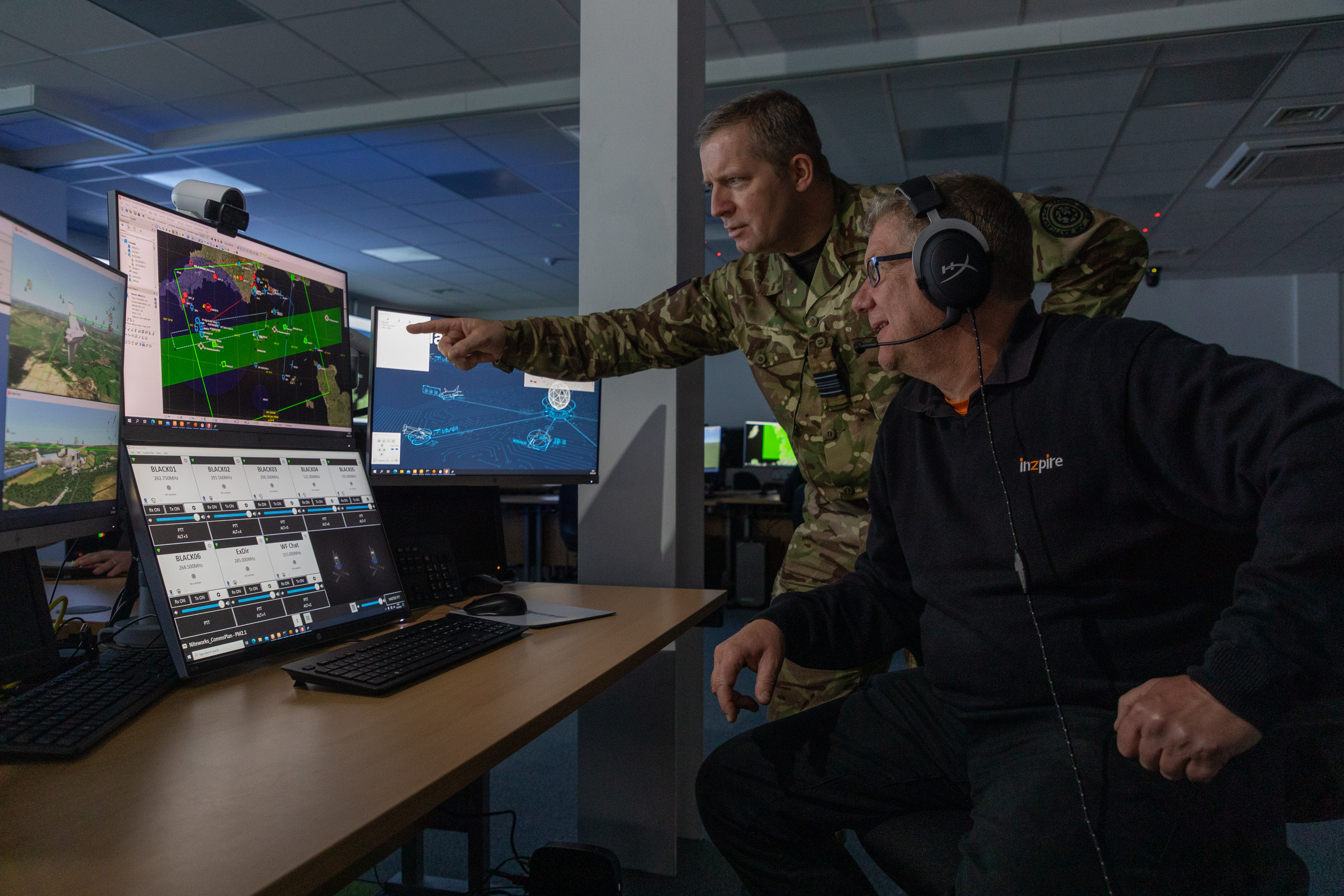 RAF Officer and contractor, working together with the training system