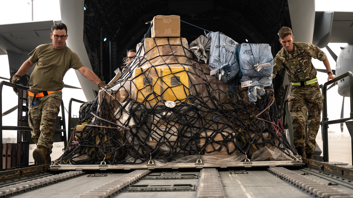 RAF Movers unloading supplies from atlas aircraft