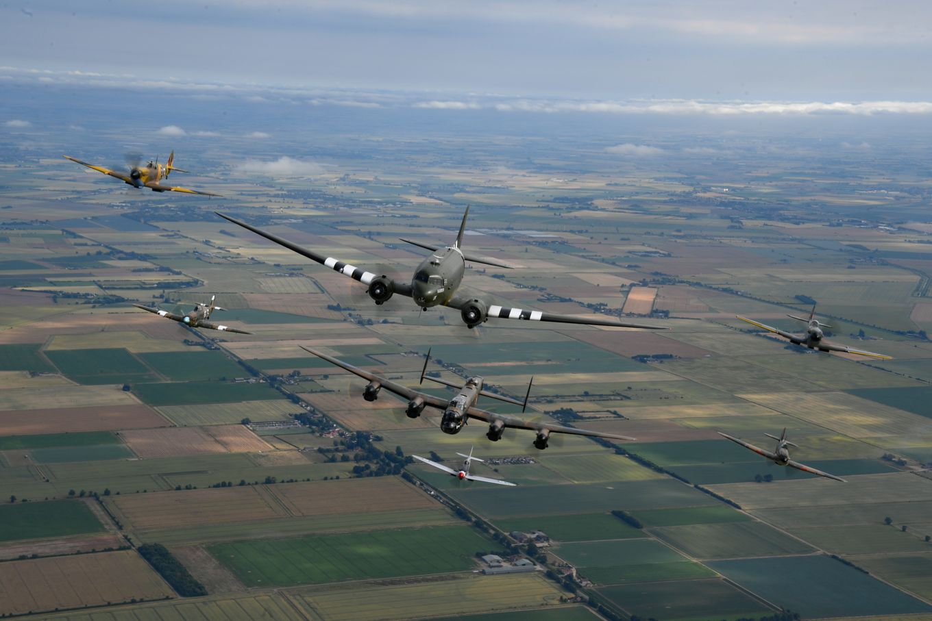 Dakota, Lancaster, 3 Spitfires and 2 Hurricanes display flying