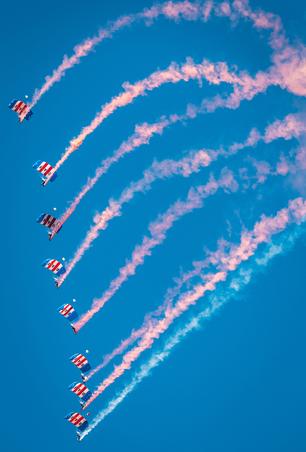 The RAF Falcons perform their famous non-contact canopy stack for the crowds
