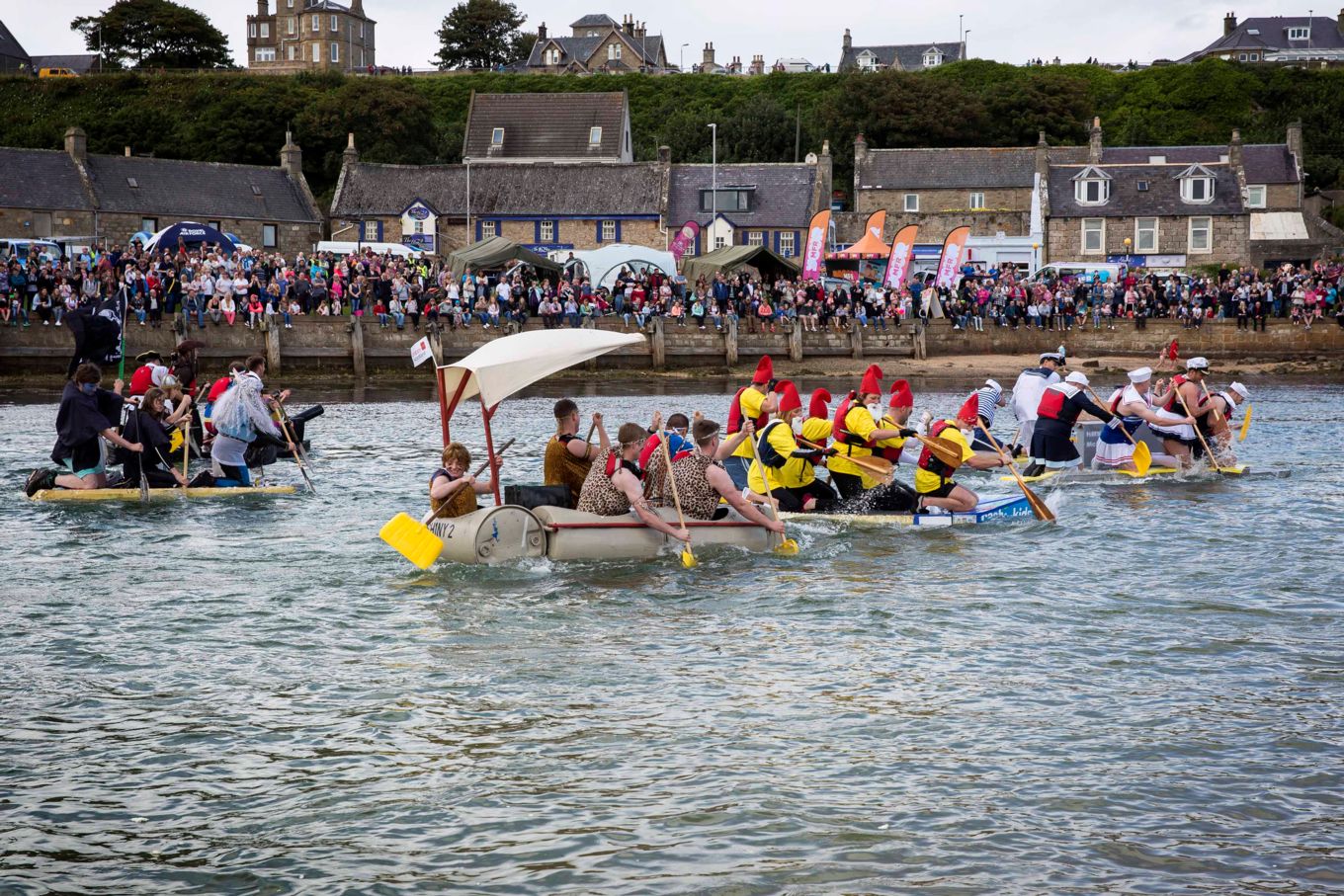Rafts taking part in the Lossiemouth Raft Race