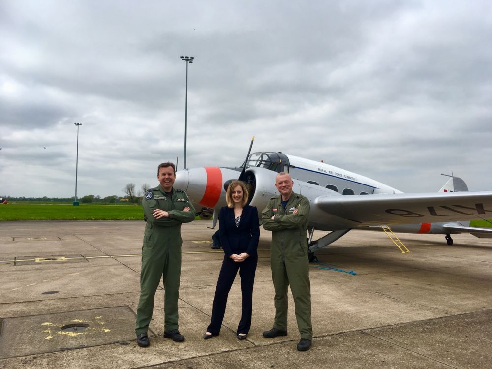 Station Commander Group Cation Baulkwill, BAE Systems Alison Ballard and Peter Kosogorin in front of the Avro Anson.