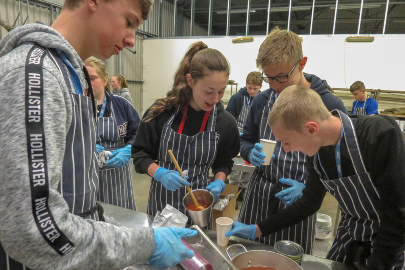 The students learn military catering with 3 Mobile Catering Squadron.
