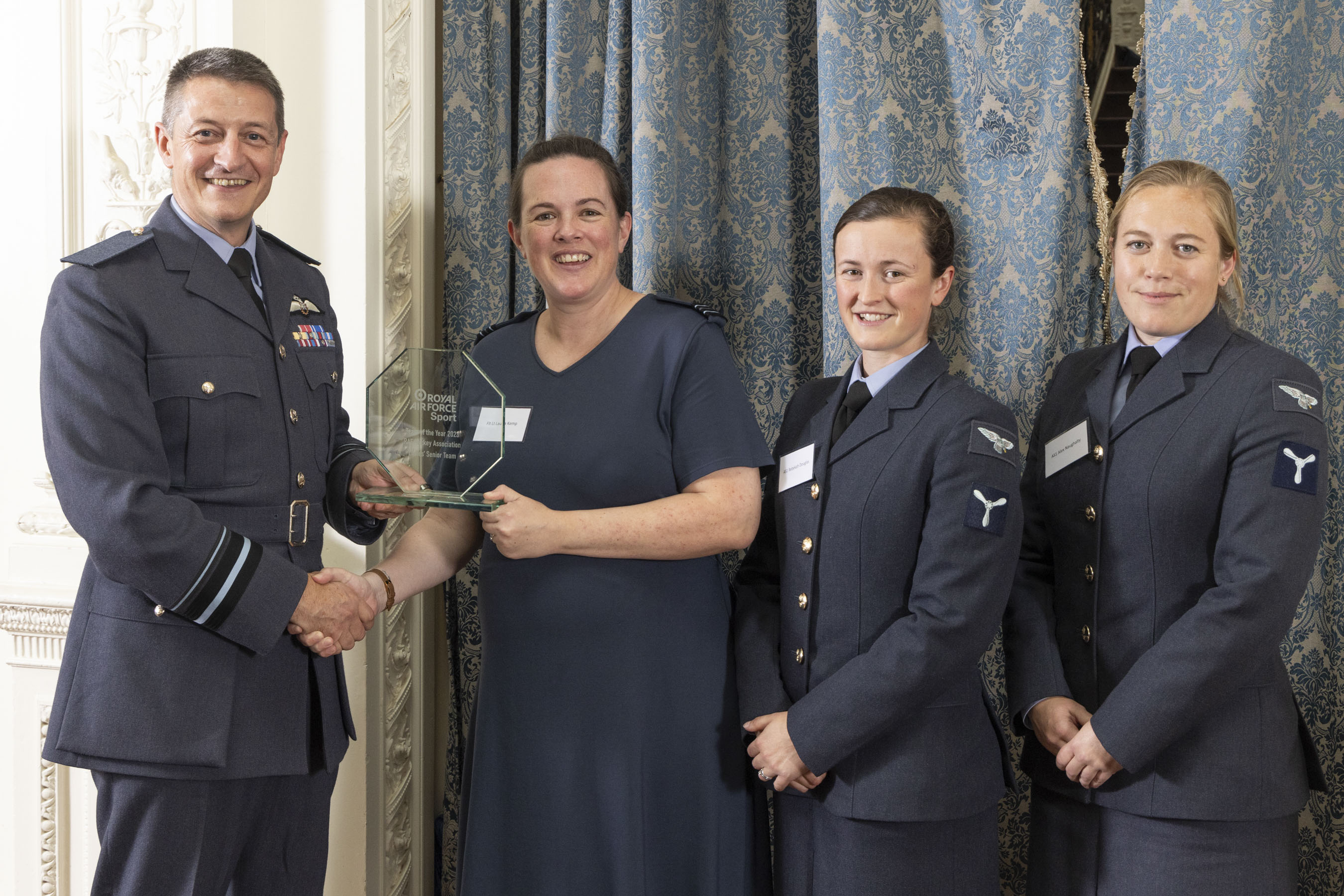 RAF Hockey Ladies' Senior Team receiving Sports Team of the Year award