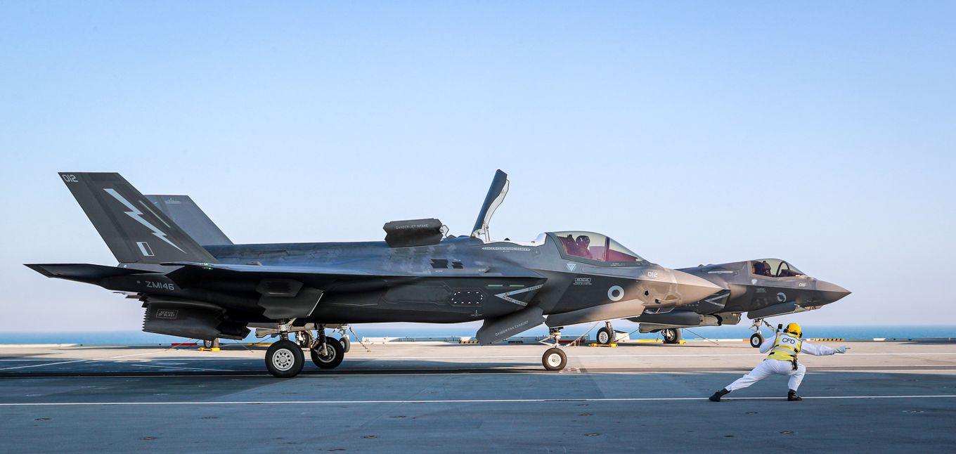 Image shows F35 aircraft about to take off from the aircraft carrier