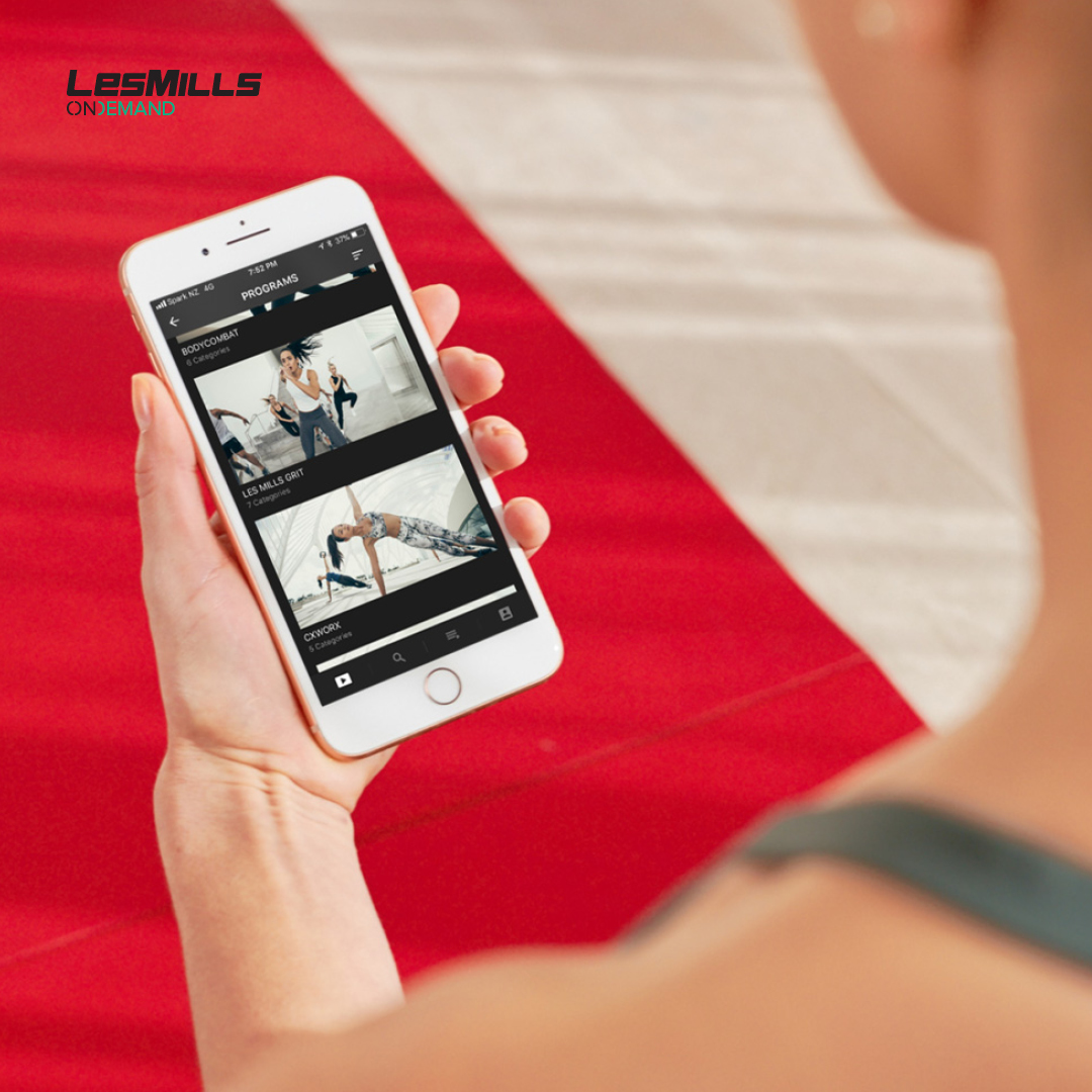 Image shows a smartphone using showing a fitness workout.